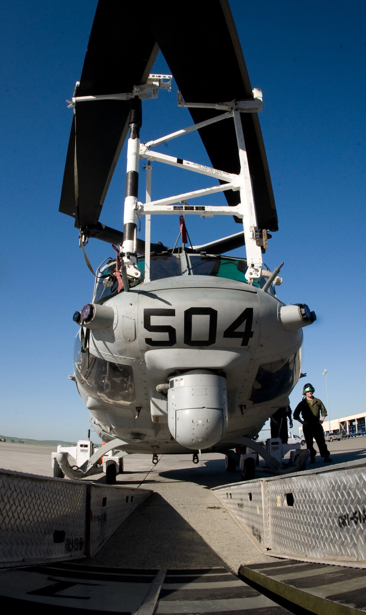 A Marine UH-1Y helicopter is ready and configured to be test-loaded into a C-5C Galaxy.  Airmen from Travis Air Force Base, Calif., and Marines from Camp Pendleton, Calif., came together at Travis AFB April 20 to determine how the helicopter best fit into the cargo bay of the C-5 and how many could be loaded at one time.  The goal is to get helicopters into the area of responsibility faster and ultimately into the fight.  (U.S. Air Force photo/Lance Cheung)