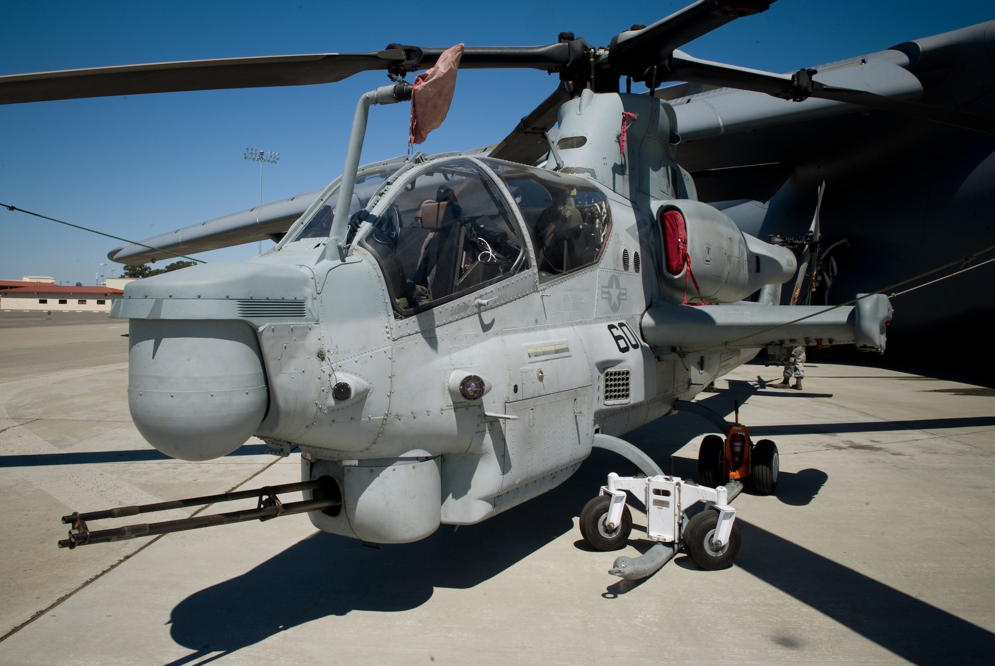 A Marine AH-1Z Super Cobra attack helicopter is ready and configured to be test-loaded into a C-5C Galaxy.  Airmen from Travis Air Force Base, Calif., and Marines from Camp Pendleton, Calif., came together at Travis AFB April 20 to determine how the helicopter best fit into the cargo bay of the C-5 and how many could be loaded at one time.  The goal is to get helicopters into the area of responsibility faster and ultimately into the fight.  (U.S. Air Force photo/Lance Cheung)