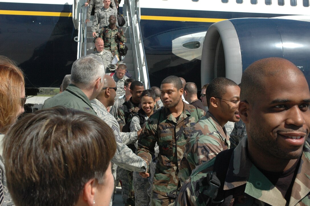 LANGLEY AIR FORCE BASE, Va. --  Airmen return from a 120-day deployment to Kadena Air Base, Japan April 18.  The goal of the deployment was to support the Pacific Theater Security Package and ensure stability in the region.  (U.S. Air Force photo)
