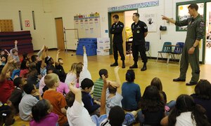 LANGLEY AIR FORCE BASE, Va. -- Maj. Dave "Zeke" Skalicky, F-22A Raptor Demonstration Team pilot, answers questions from third graders at Thalia Elementary School in Virginia Beach April 22.  The F-22 Demonstration Team visited schools throughout the local community as a part of Hampton Roads Air Force Week activities. This week is a chance to tell their Air Force story, showcase warfighting capabilities and thank the community for their support.  (U.S. Air Force photo/Staff Sgt. Tabitha Kuykendall)
