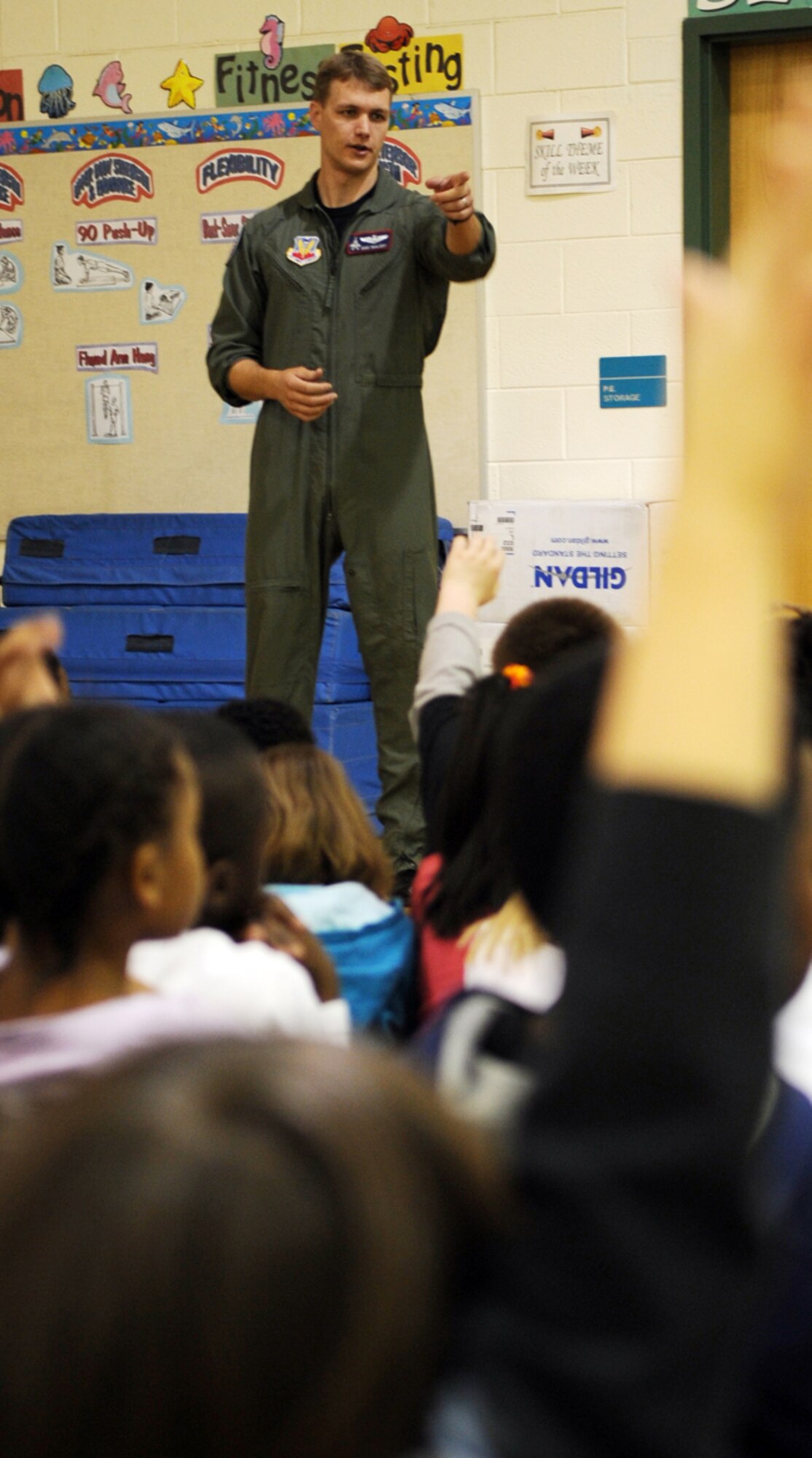 LANGLEY AIR FORCE BASE, Va. -- Maj. Dave "Zeke" Skalicky, F-22A Raptor Demonstration Team pilot, answers questions from third graders at Thalia Elementary School in Virginia Beach April 22.  The F-22 Demonstration Team visited schools throughout the local community as a part of Hampton Roads Air Force Week activities. This week is a chance to tell their Air Force story, showcase warfighting capabilities and thank the community for their support.  (U.S. Air Force photo/Staff Sgt. Tabitha Kuykendall)
