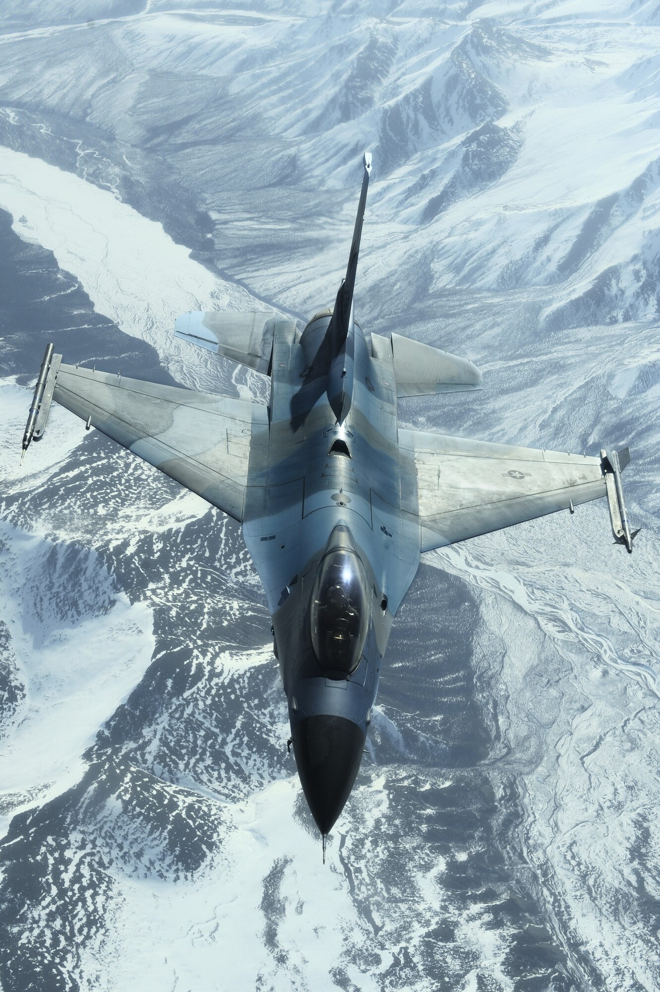 An F-16 Aggressor, 18th Aggressor Squadron, flies over the Joint Pacific Alaskan Range Complex during RED FLAG-Alaska 09-2 April 22, 2009, Eielson Air Force Base, Alaska. The 18th AGRS is a Squadron dedicated to support RF-A and additionally focuses on air combat at a tactical and operational level.  (U.S. Air Force Photo/Senior Airman Jonathan Snyder)