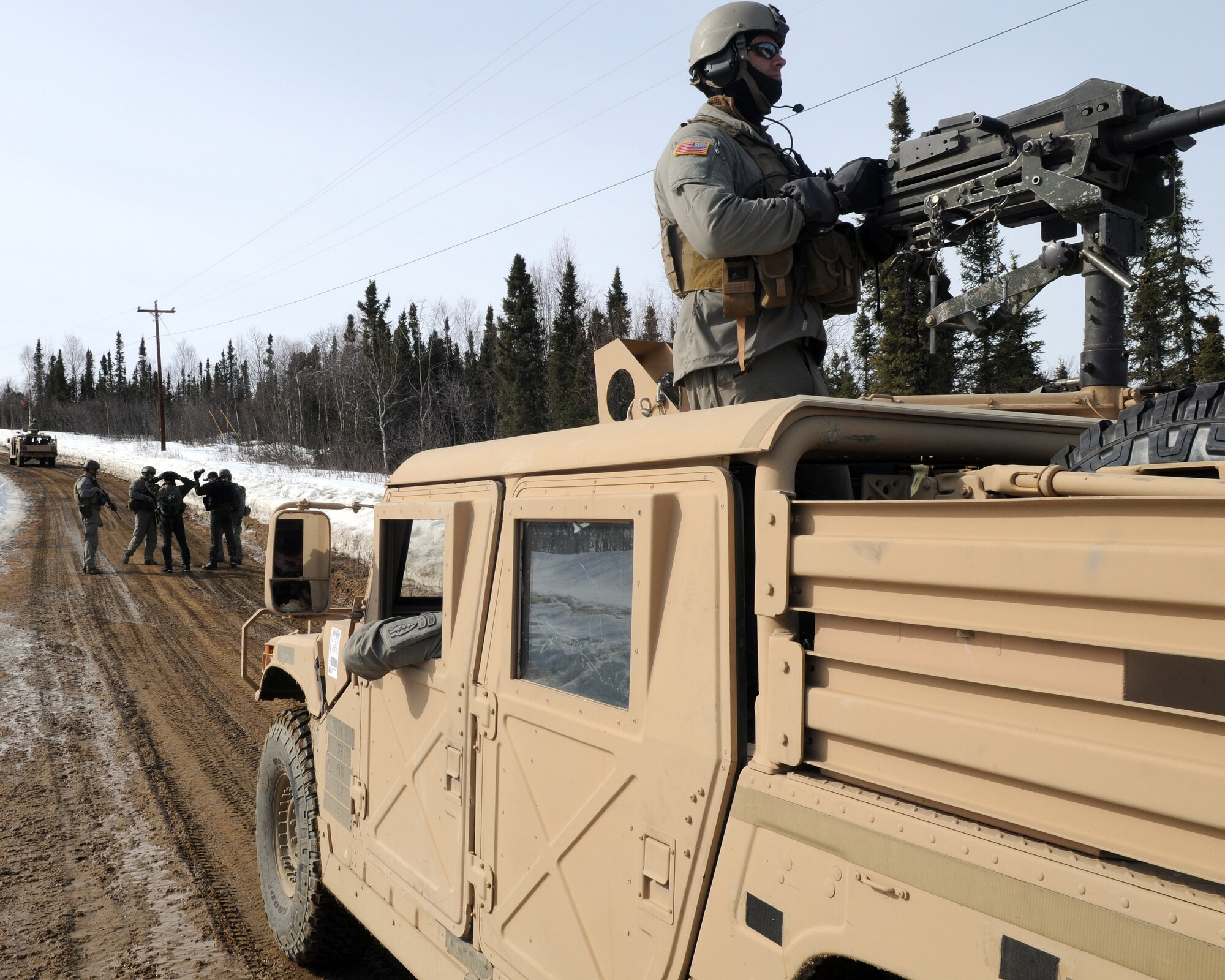 An Army Special Forces member from the 1st Special Forces Group-Alpha provides security during a Red-Flag Alaska 09-2 training exercise on April 22, 2009, Eielson Air Force Base, Alaska. Security is vital during training operations where various identifiers must be authenticated before the individuals being rescued can be brought to safety. (U.S. Air Force photo/Airman 1st Class Willard E. Grande II)
