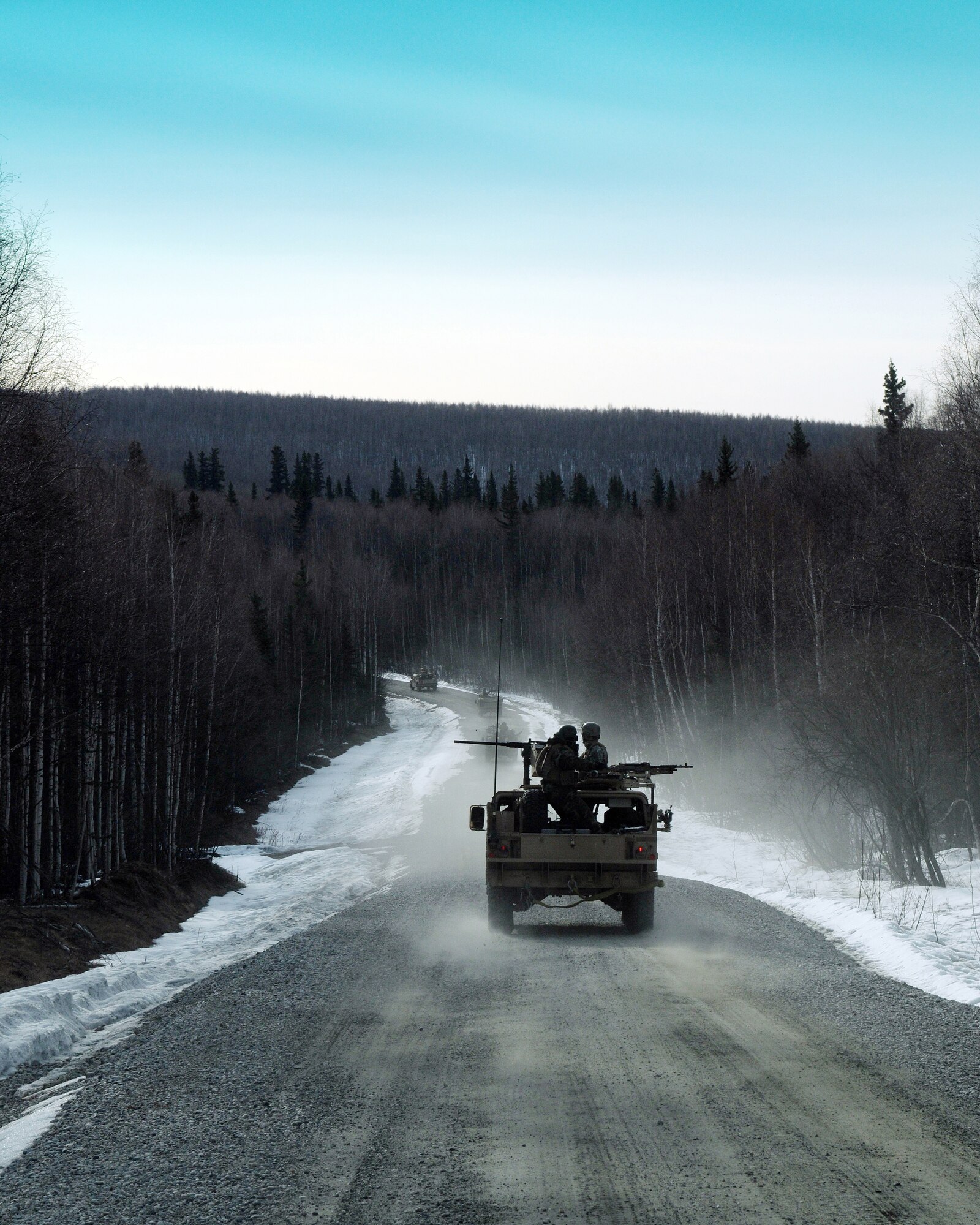 A convoy of Army Special Forces from the 1st Special Force Group - Alpha travel to the proposed rescue site of simulated downed pilots during Red-Flag Alaska 09-2 on April 22, 2009, Eielson Air Force Base, Alaska. The 67,000 square miles of the Joint Pacific Alaska Range Complex, where RF-A operations are held, benefits not only aerial training but ground operations as well. (U.S. Air Force photo/Airman 1st Class Willard E. Grande II)