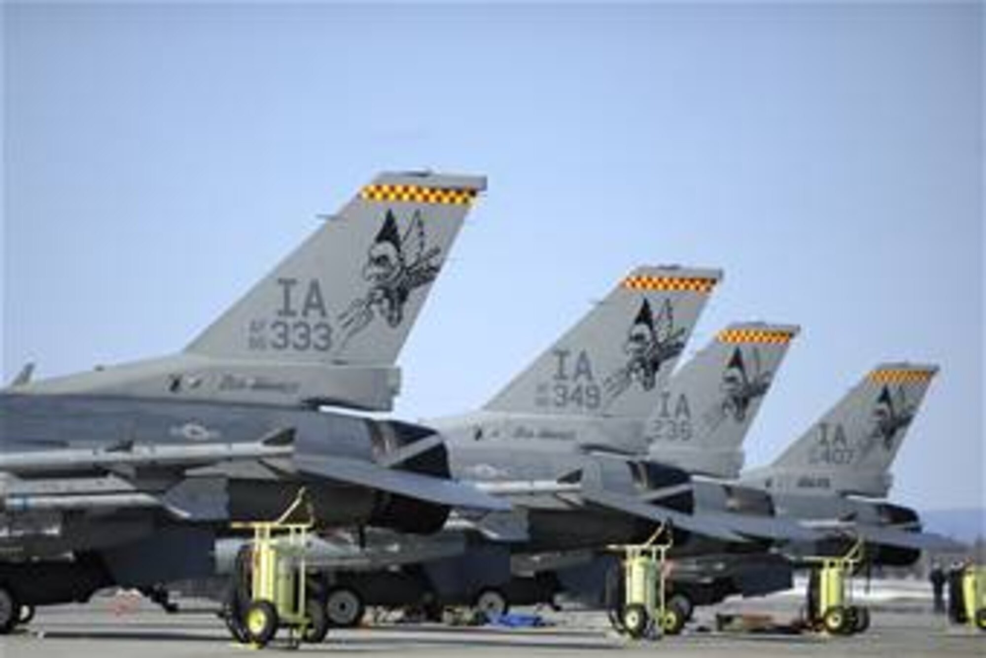 Four F-16 Fighting Falcons from the Iowa Air National Guard's 132nd Fighter Wing in Des Moines sit on the tarmac at Eielson Air Force Base, Alaska, April 16 in preparation for the next Red Flag-Alaska 09-2 mission. Red Flag-Alaska is a Pacific Air Forces-directed field training exercise for U.S. and coalition forces flown who fly under simulated air-combat conditions.  (U.S. Air Force photo/Senior Airman Jonathan Snyder)