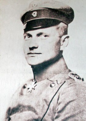 Manfred von Richthofen, known in history as “The Red Baron.”  Despite association with the famous scarlet-red triplane, most of his 80 victories occurred in a two-winged Albatross D II or D III. Members of his Jasta, or squadron, were known as “The Flying Circus”.  All of his pilots had some shade of red on their aircraft, but only Richthofen was allowed to have one solid shade of red.  As his fame grew, some members of Allied air forces painted the noses of their own aircraft red, which was their way of announcing their intention to hunt down the Red Baron. He is credited with the downing of famed British Ace Maj. Lanoe Hawker, who became his eleventh victim. Controversy surrounds who actually killed von Richthofen April 21, 1918. (Air Force photo/Tech. Sgt. Steven Wilson)