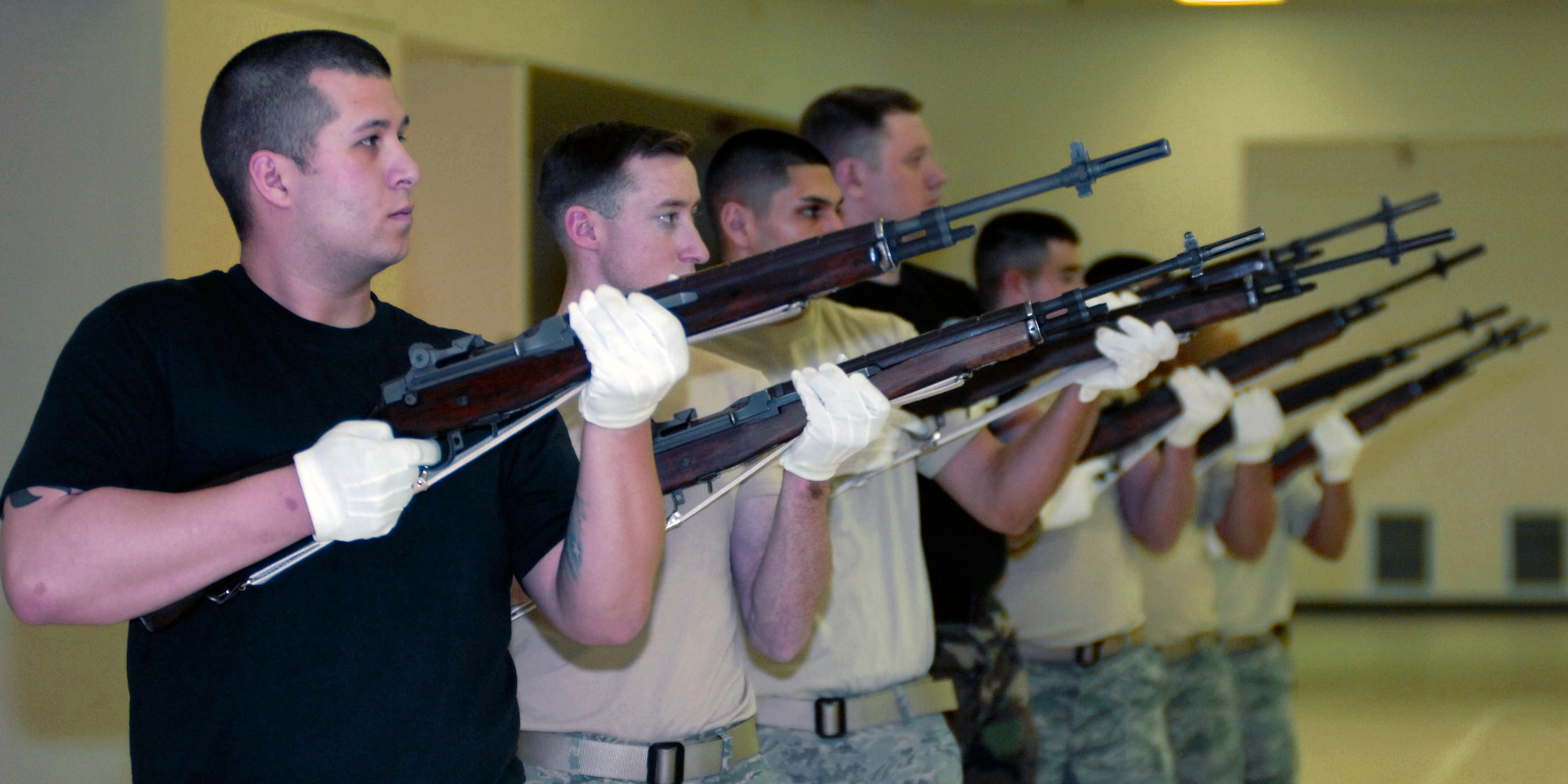 ELMENDORF AIR FORCE BASE, Alaska -- Members of the Elmendorf Honor Guard undergo training from members of the Air Force Honor Guard on Thursday, April 16. All students that passed the course graduated on Wednesday, April 22. (U.S. Air Force photo by Senior Airman Laura Turner)