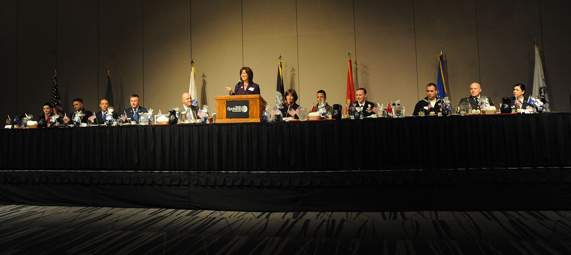 SPOKANE, Wash. – Various military members from all four services are represented on stage at the Armed Forces Person of the Year luncheon at the convention center. The event is held annually, and hosted by Greater Spokane Incorporated and given to what Spokane representatives call the best of the best - military members who excel in not only their military duties, but also contribute greatly to the community. (U.S. Air Force photo / Staff Sgt. JT May III)
