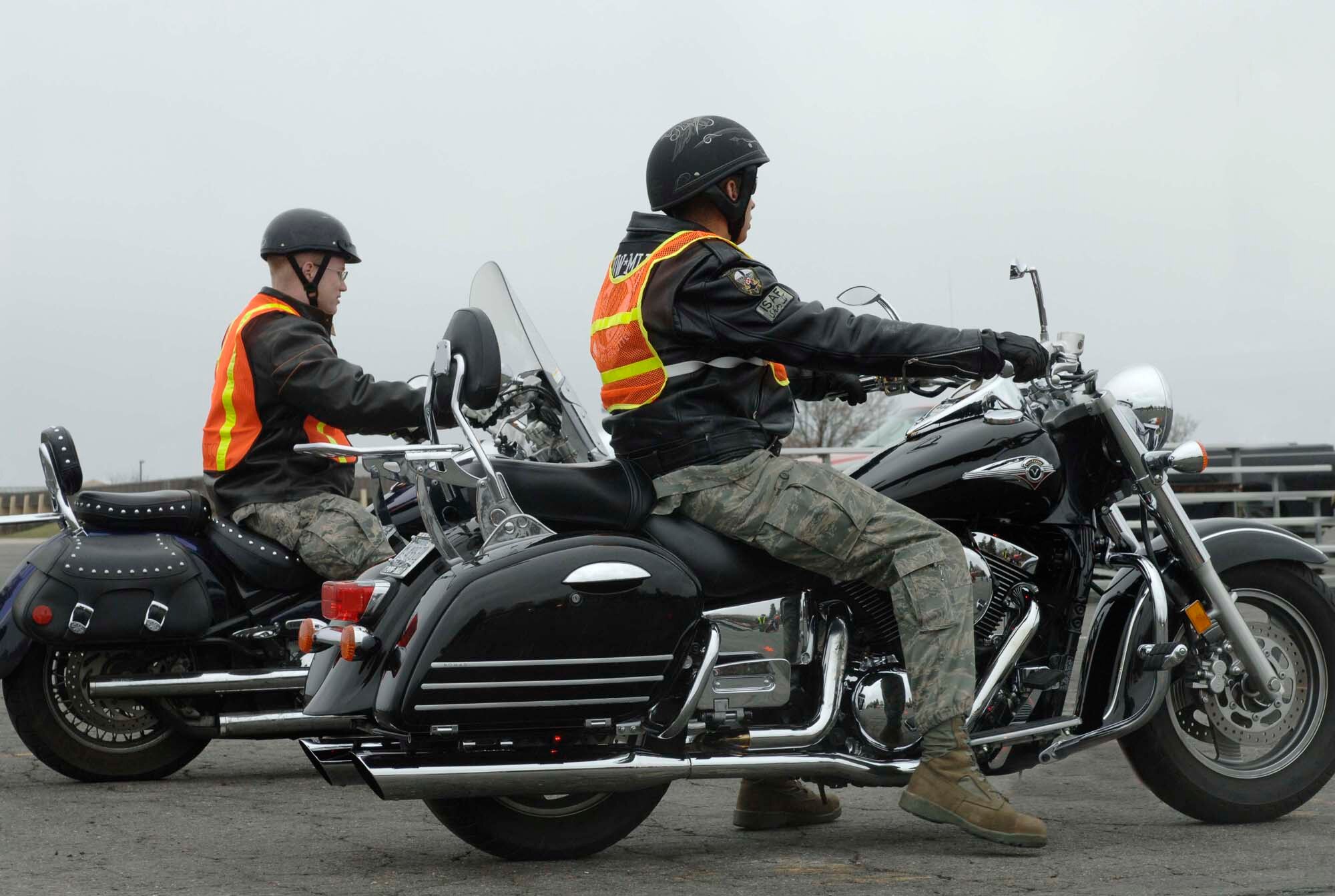 Fairchild members await the start of an activity during the motorcycle safety event that was held at the parade grounds April 17. Motorcyclists are required to know what is expected when riding on an installation as well as requirements for Washington State.  These requirements were organized to reduce two-wheeled vehicle mishaps. (U.S. Air Force photo / Airman 1st Class Darlene West)