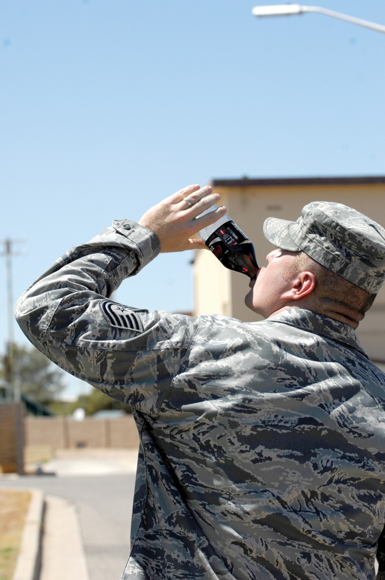 #2 Improper actions while in uniform
It is understandable that members are required to multitask to complete the many requirements throughout the duty day. However, some actions, as harmless as they may seem, are violations of AFI 36-2903, Dress and Personal Appearance of Air Force Personnel. In section 1.3, Individual Responsibilities, it states that members will not smoke, use smokeless tobacco, drink or eat while walking in uniform. Not only do these actions present a negative military image, they are violations of governing AFIs.  (U.S. Air Force photo illustration)