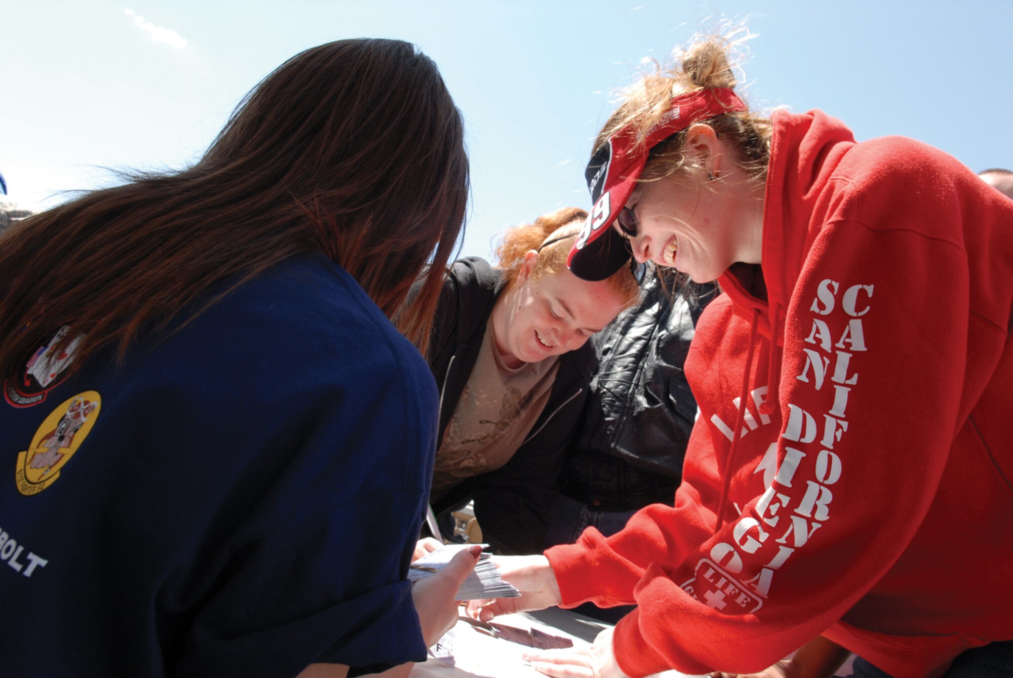 Melissa Rickabaugh and Janelle Donovan waited in line for two hours to get free tickets to the Subway Fresh Fit 500 NASCAR Sprint Cup Series. “I love NASCAR!” said Ms. Rickabaugh. (U.S. Air Force photo/ Deborah Silliman Wolfe)