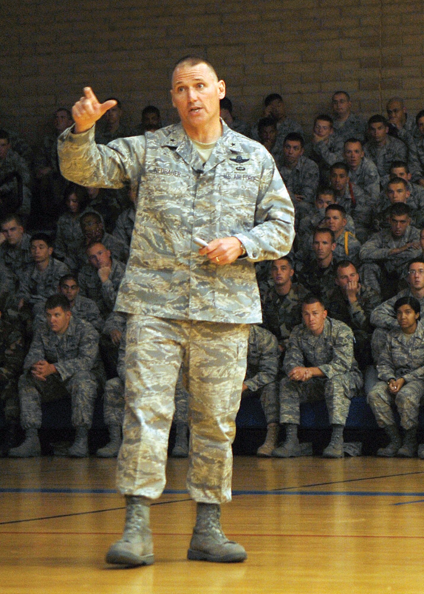 Brig. Gen. Kurt Neubauer, 56th Fighter Wing commander, speaks to Luke Airmen during a commander’s call Tuesday at the fitness center. The focus of the commander’s call was the upcoming unit compliance inspection which begins May 4. (U.S. Air Force photo/Airman 1st Class Ronifel Yasay)