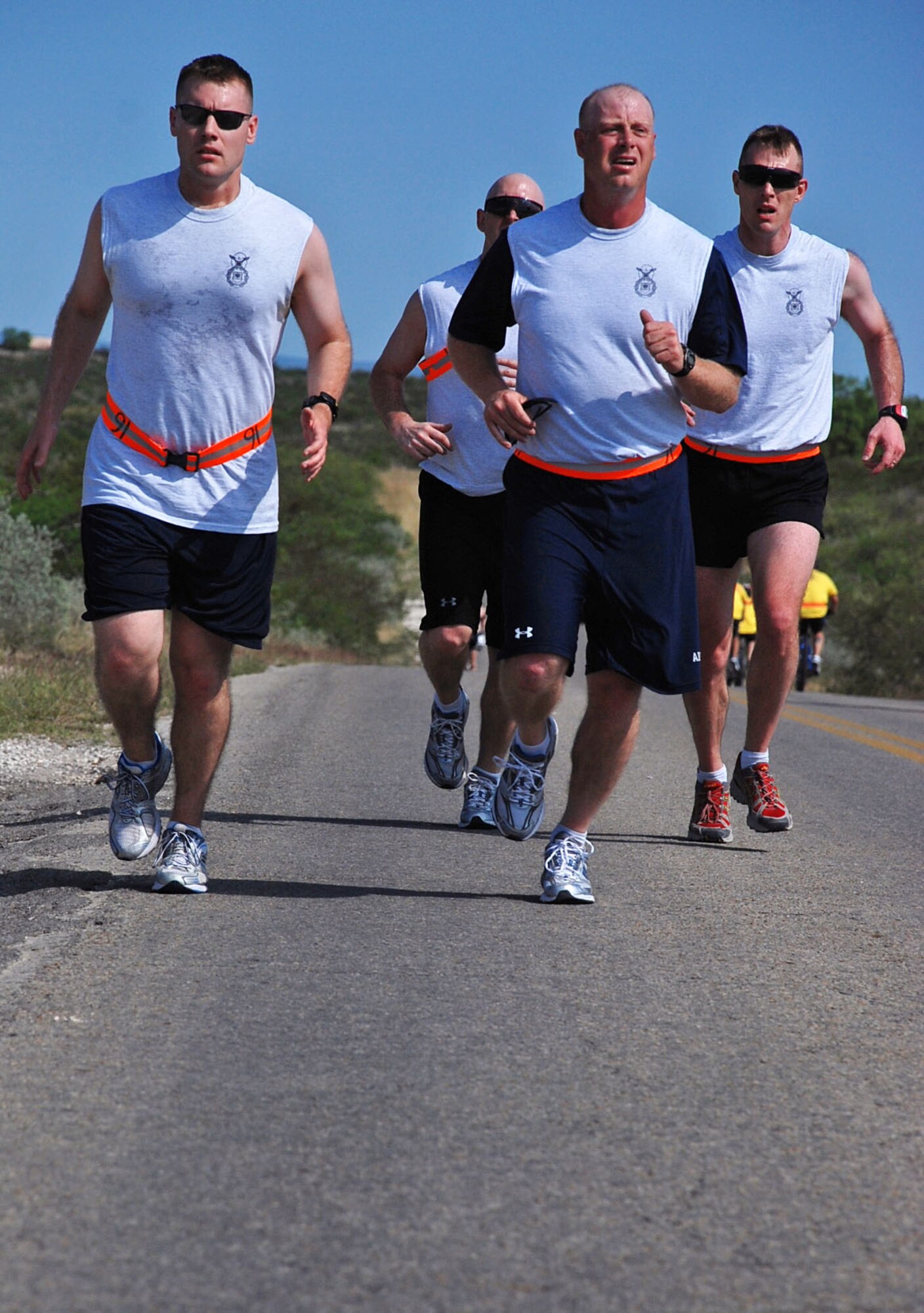 LAUGHLIN AIR FORCE BASE, Texas –A team from the 47th Security Forces runs towards the next check point during the 7-mile run portion of the Adventure Race V held here April 18. (U.S. Air Force photo by Airman 1st Class Sara Csurilla)