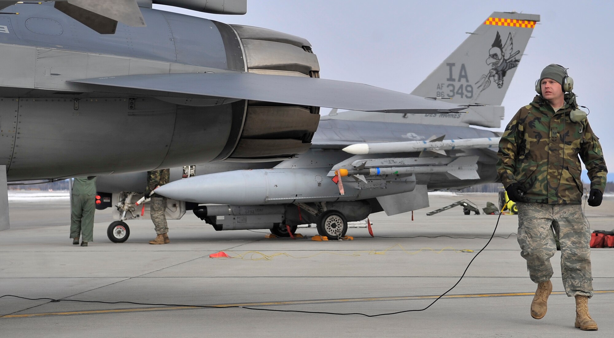 Staff Sgt. James George performs a walk-around inspection of an F-16 Fighting Falcon that had returned from a mission April 17 during Red Flag-Alaska at Eielson Air Force Base, Alaska.  Red Flag-Alaska is a Pacific Air Forces-directed field training exercise for U.S. and coalition forces flown under simulated air-combat conditions. Sergeant George is a crew chief from the Iowa Air National Guard's 132nd Fighter Wing from Des Moines.  (U.S. Air Force photo/Senior Airman Christopher Boitz)