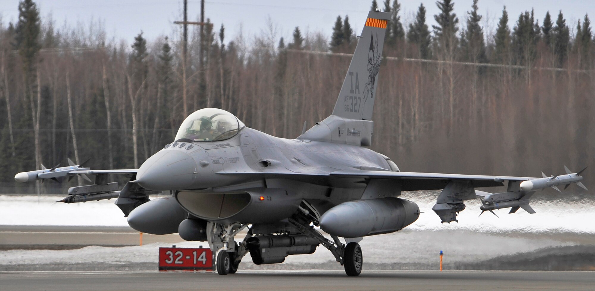 An F-16 Fighting Falcon from the Iowa Air National Guard's 132nd Fighter Wing in Des Moines returns to Eielson Air Force Base, Alaska, from a familiarization flight April 17 during Red Flag-Alaska. Red Flag-Alaska is a Pacific Air Forces-directed field training exercise for U.S. and coalition forces who fly under simulated air-combat conditions. (U.S. Air Force photo/Senior Airman Christopher Boitz)