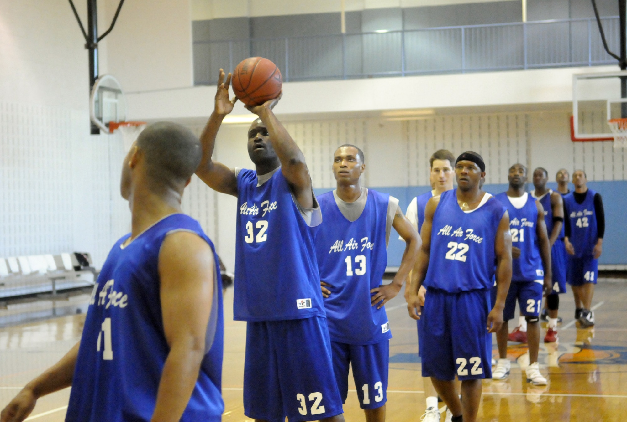 Players line up for a drill during try-out camp for the All-Air Force men's basketball team at the Robins Fitness Center gym April 22. U. S. Air Force photo by Sue Sapp