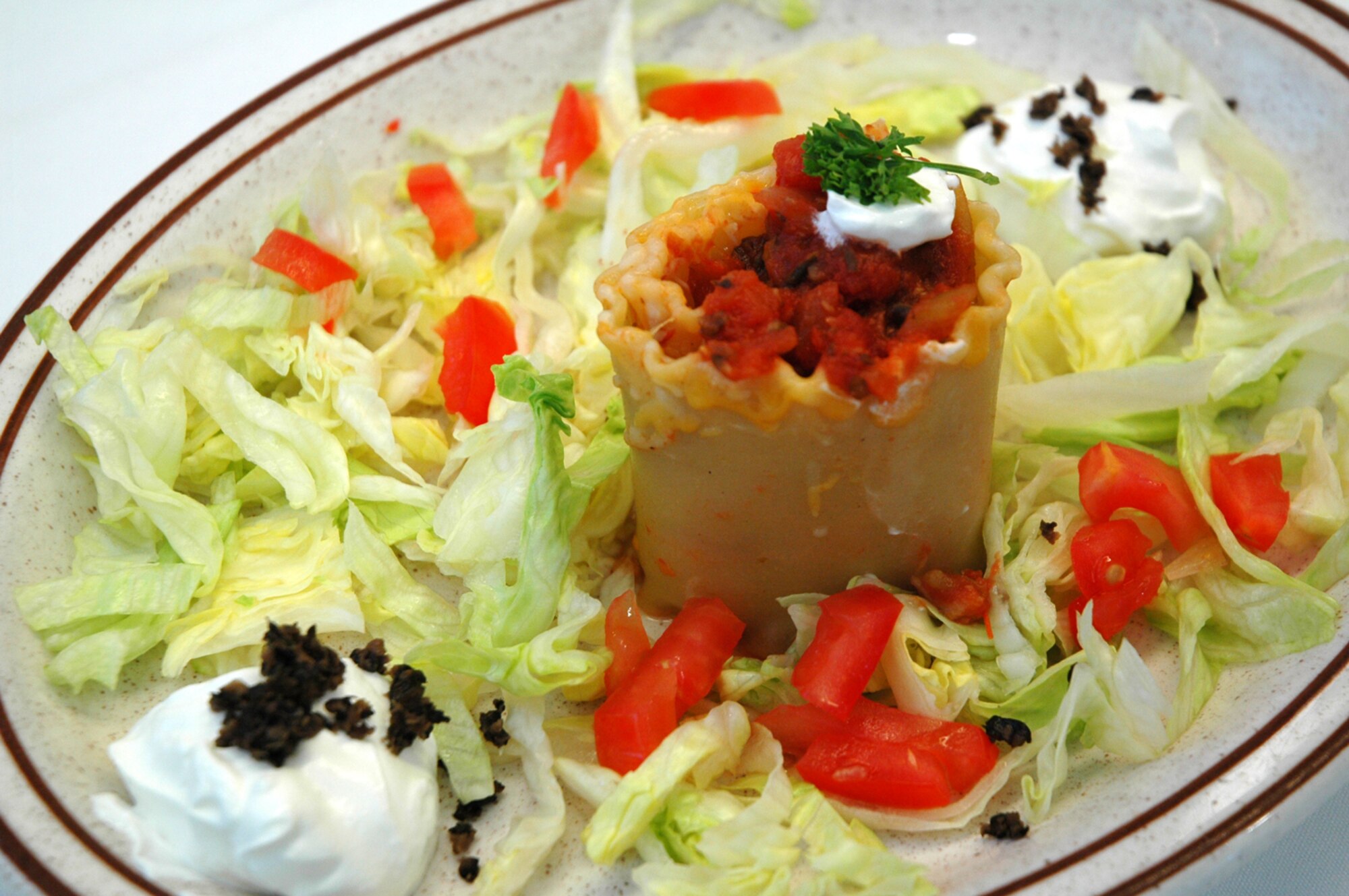 Mexican Chicken Lasagna, prepared by Airmen 1st Class Frank Hernandez and Tanya Cedeno, 341st Force Support Squadron food service specialists, took first place during a Warrior Chef Competition April 15 at the Elkhorn Dining Facility. (U.S. Air Force photo/Senior Airman Dillon White)
