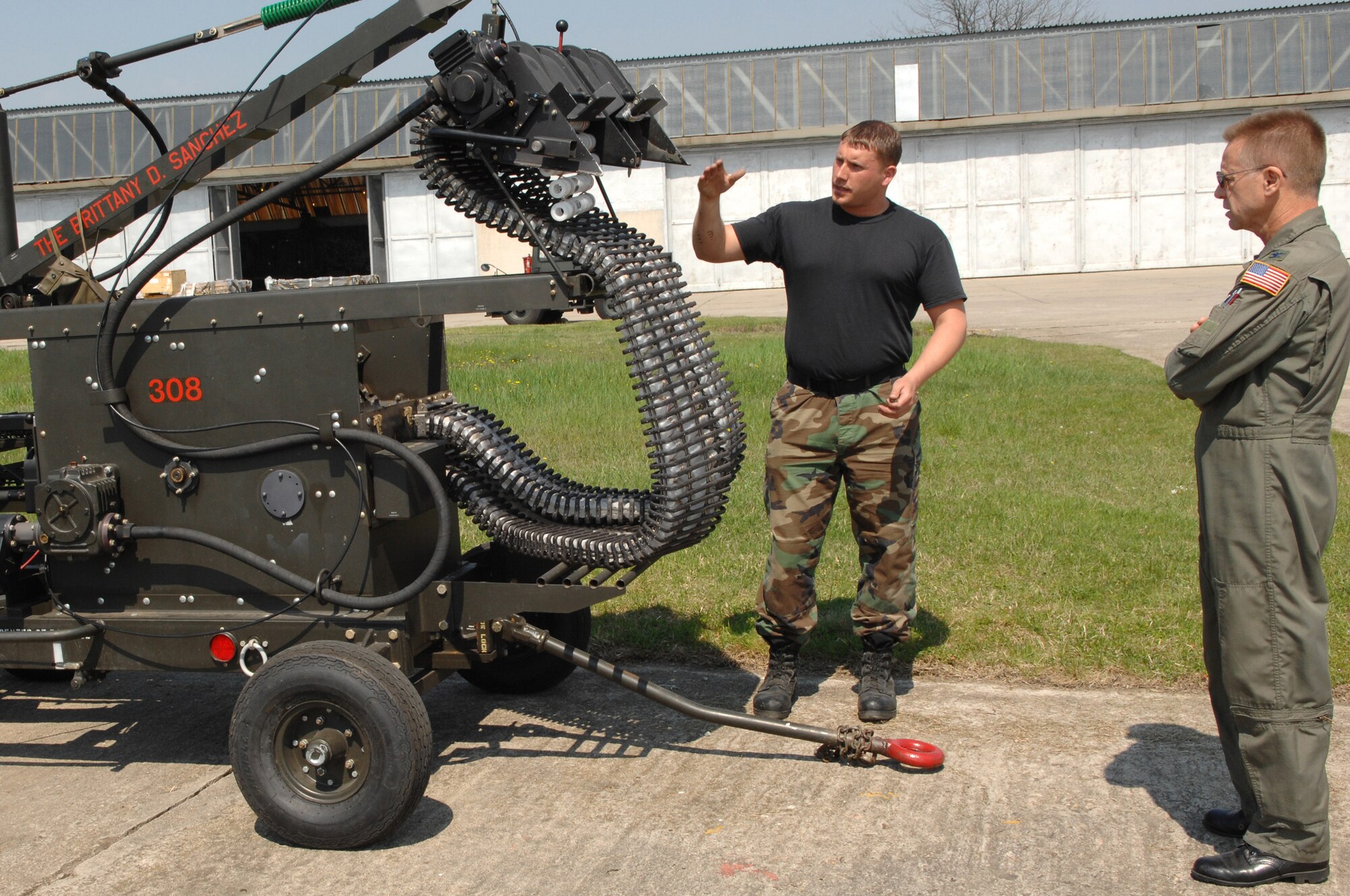 Tech. Sgt. Jeremy Watson demonstrates A-10 Thunderbolt II armament equipment to Col. Pete Maynard April 17 at Bezmer Air Base, Bulgaria. Sergeant Watson is an armament systems technician with athe 52nd Equipment Maintenance Squadron at Spangdahlem Air Base, Germany, and  Colonel Maynard is the Bulgarian defense attache. (U.S. Air Force photo/Master Sgt. Bill Gomez) 
