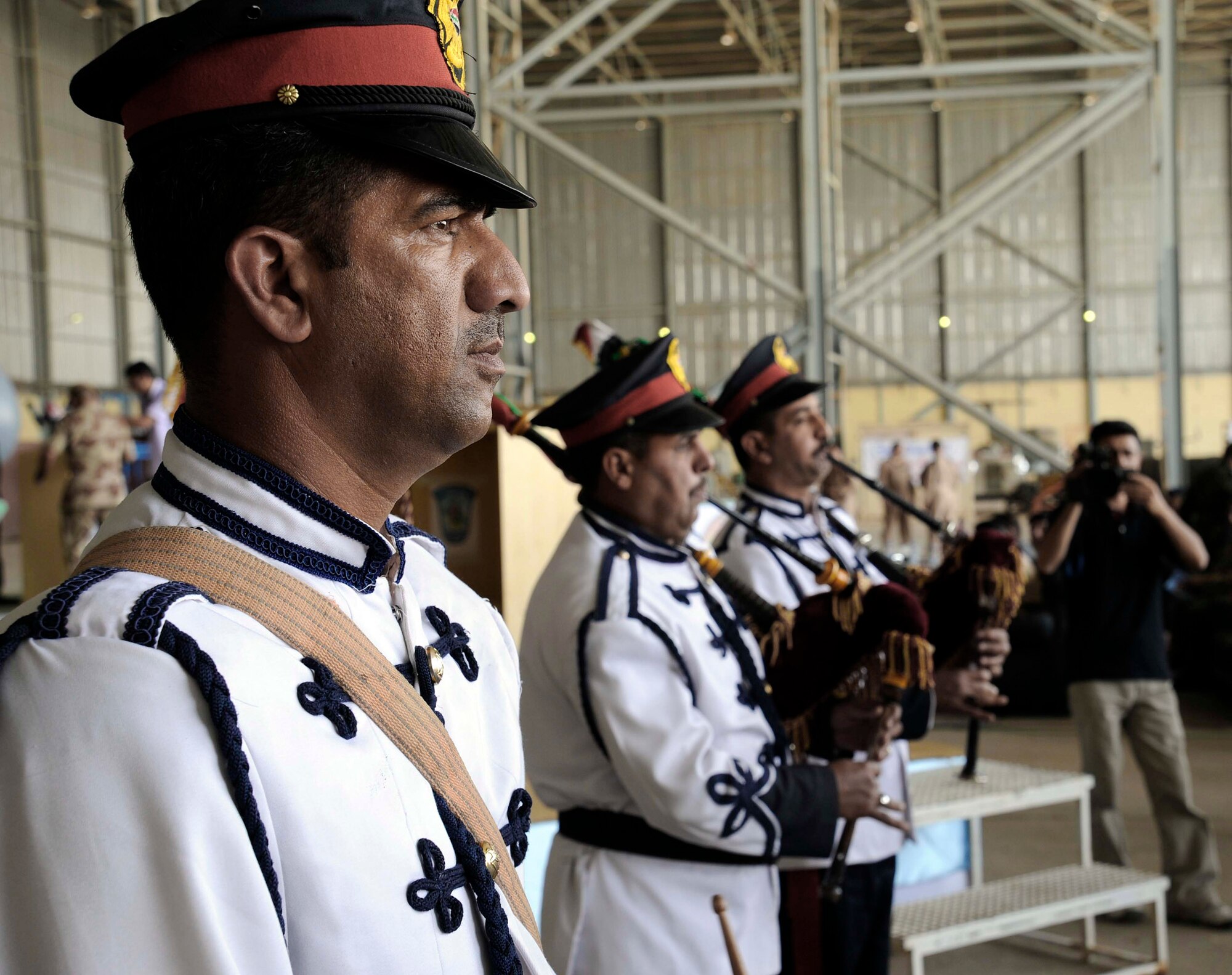 An Iraqi air force band plays for the crowd at the 78th annual Iraqi Air Day at New al-Muthana Air Base April 22.  Iraqi officials, to include the Iraqi minister of defense and the Iraqi air force chief of staff, spoke to the crowd on how far the Iraqi air force has come in the past few years. (U.S. Air Force photo/Senior Airman Jacqueline Romero)
