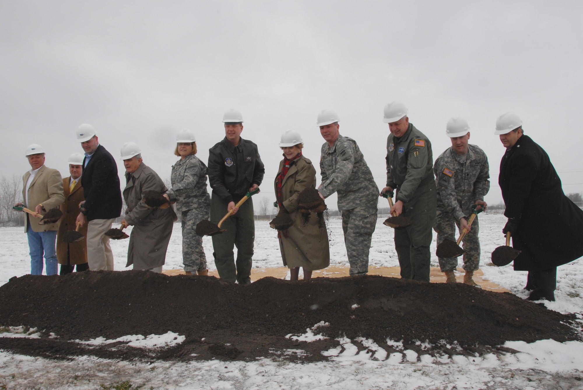 Dignitaries and VIP?s gather for a ground breaking ceremony for an Armed Forces Reserve Center slated to be built at the Niagara Falls Air Reserve Station.  Left to right:  Mr. Ken Kramer, Vice President, TCI Inc., Mr. Brian Reitzel, Project Manager, TCI Inc., Mr. Josh Feldmann, Project Manager, U.S. Army Engineer, Buffalo District, Mr. Michael Hrywnak, Construction Representative, U.S. Army Engineer ,New York District, Col. Rosemary Kuca, Former Commander 865th Combat Support Hospital, U.S. Army Reserve, Col. Allan Swartzmiller, 914th Airlift Wing Commander, Congresswoman Louise Slaughter, Brig. Gen. Michael Smith, Deputy Commanding General 99th Regional Support Command, Col. Patrick Ginavan, 107th Airlift Wing Commander, Lt. Col. Daniel Snead, Commander U.S. Army Engineer , Buffalo District, Mr. Merrell Lane, President, Niagara Military Affairs Council. (AF Photo by SMS Ray Lloyd)	 