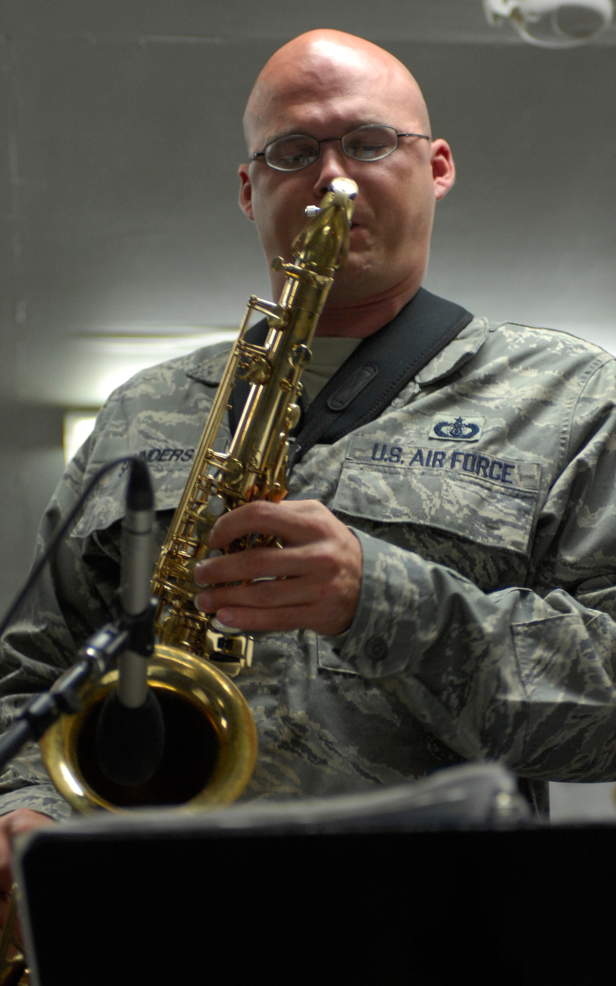 Tech. Sgt. Jeff Saunders plays the saxophone for U.S. and coalition servicemembers at Bagram Air Field, Afghanistan, April 20. Sergeant Saunders is a band member with Sirocco, the U.S. Air Forces Central Expeditionary Band, which is touring the AFCENT area of operations. He and the other band members are deployed to Southwest Asia from the U.S. Air Forces in Europe Band at Sembach Air Base, Germany. Sergeant Saunders is originally from Binghamton, N.Y. (U.S. Air Force photo/Tech. Sgt. Elizabeth Weinberg)