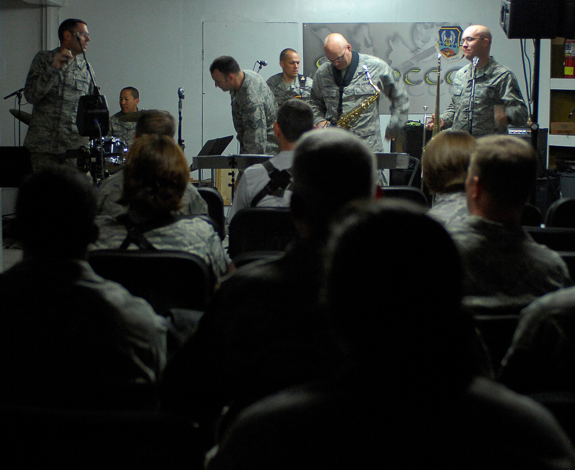 U.S. and Coalition servicemembers watched the Sirocco band at Bagram Air Field, Afghanistan, April 20. The U.S. Air Forces Central Expeditionary Band is deployed to Southwest Asia from the U.S. Air Forces in Europe Band at Sembach Air Base, Germany. The band was at Bagram for three days, two of them were used for promoting and the third for their performance. (U.S. Air Force photo/ Senior Airman Erik Cardenas)(Released)