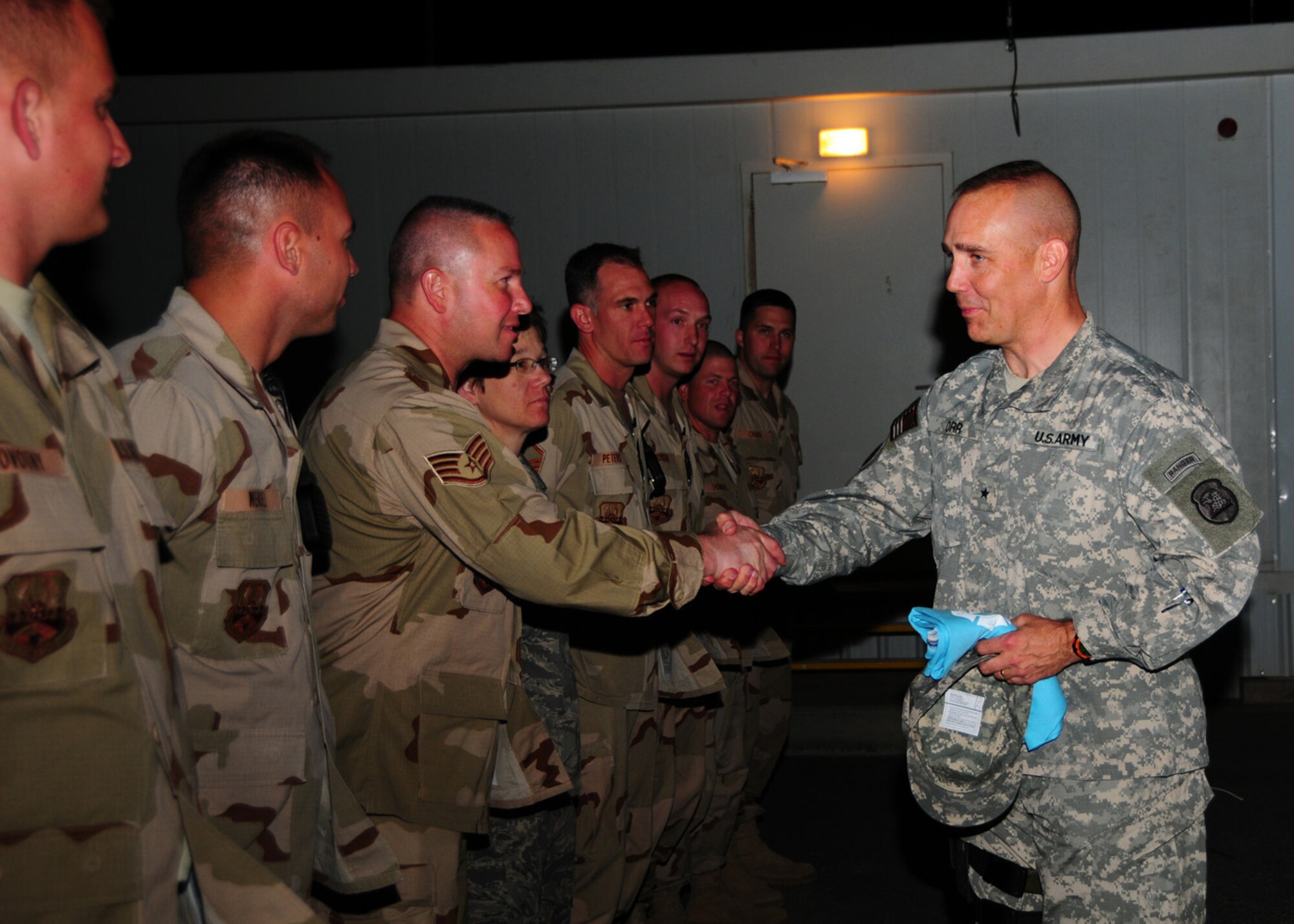 SOUTHWEST ASIA -- Army Brig. Gen. Timothy Orr, 28th Adjutant General of the Iowa National Guard, meets with Airmen from the 386th Air Expeditionary Wing at an air base in Southwest Asia, during his visit through the Area of Responsibility, April 21. General Orr is visiting Guard troops, throughout the AOR from Iowa to find out how they are doing and to give his thanks for their service. (U.S. Air Force photo/ Senior Airman Courtney Richardson)