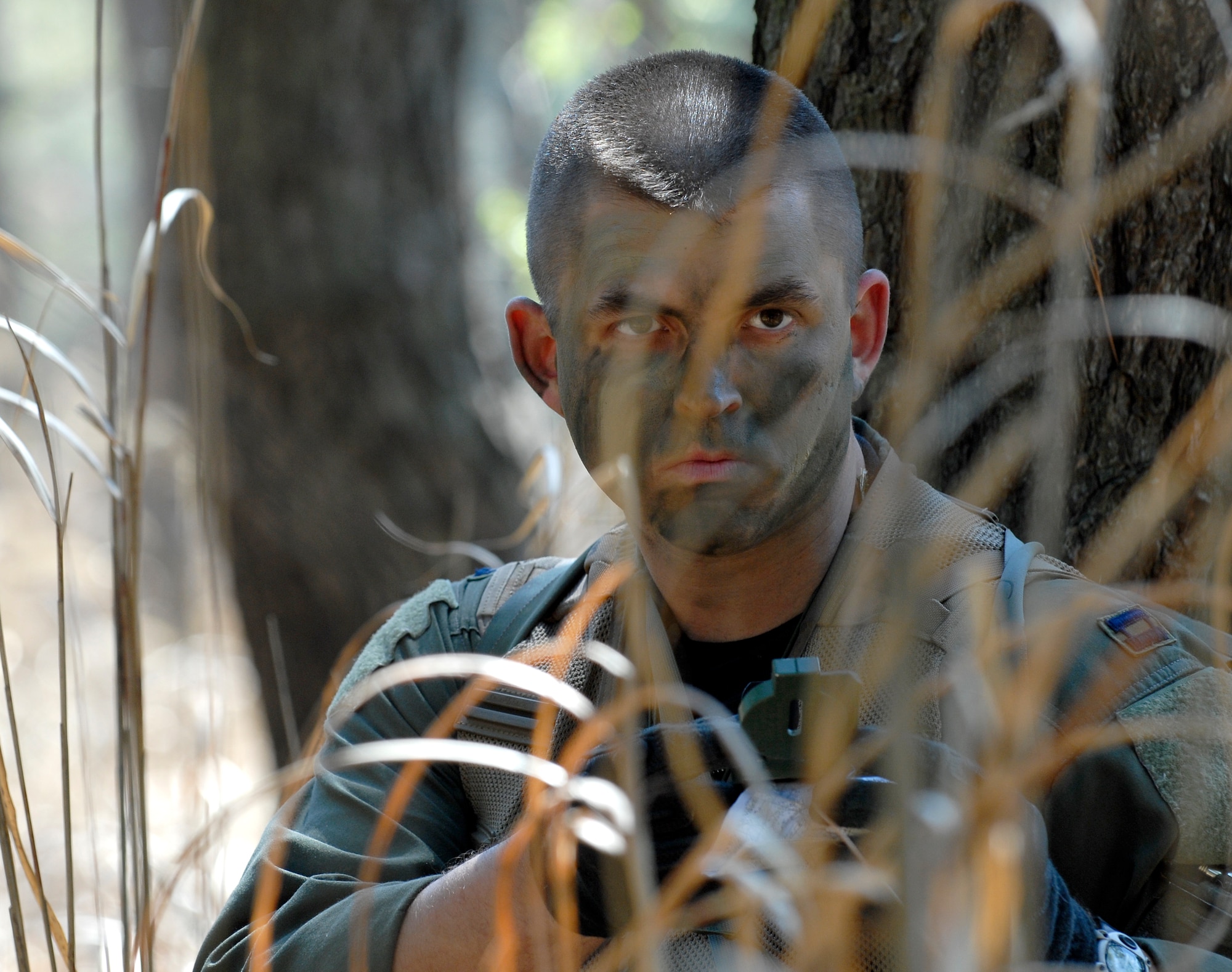 Capt. Shane Willis stops, looks and listens during a personnel recovery inspection, part of Osan Air Base's Operational Readiness Inspection, Beverly Bearcat 09-03, April 22. Captain Willis is assigned to the 25th Fighter Squadron here. (U.S. Air Force photo/Staff Sgt. Brian Ferguson)


