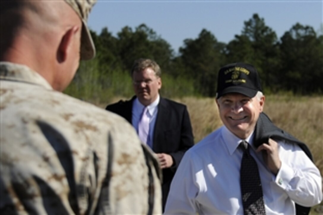 Defense Secretary Robert M. Gates talks to Marines after a demonstration at the Military Operations on Urban Terrain area while visiting Marines at Camp Lejeune, N.C., April 23, 2009. Gates visited Marines assigned to 2nd Battalion, 2nd Marine Regiment, stationed at Marine Corps Base Camp Lejeune before their upcoming deployment to Afghanistan. 
