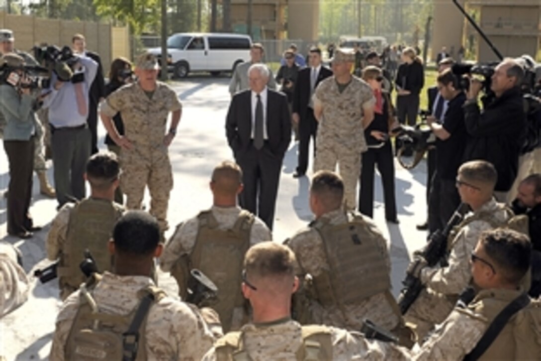 Defense Secretary Robert M. Gates talks to Marines after a demonstration at the Military Operations on Urban Terrain area while visiting Marines at Camp Lejeune, N.C., April 23, 2009. Gates visited Marines with 2nd Battalion, 2nd Marine Regiment, stationed at Marine Corps Base Camp Lejeune prior to their upcoming deployment to Afghanistan. 