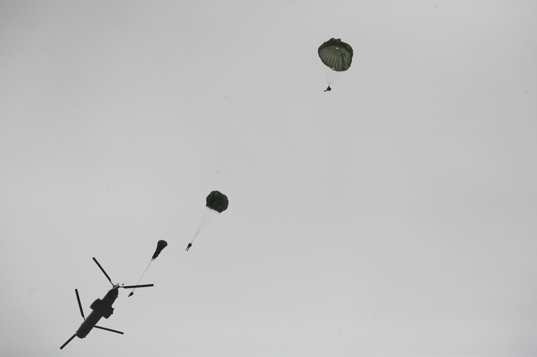 CAMP PENDLETON, Calif. - Marines with the 1st Radio Battalion parachute as part of their training for an upcoming deployment with the 11th Marine Expeditionary Unit here  April 23, 2009. (U.S. Marine Corps photo by Cpl. Shawn M. Spitler) (Released)