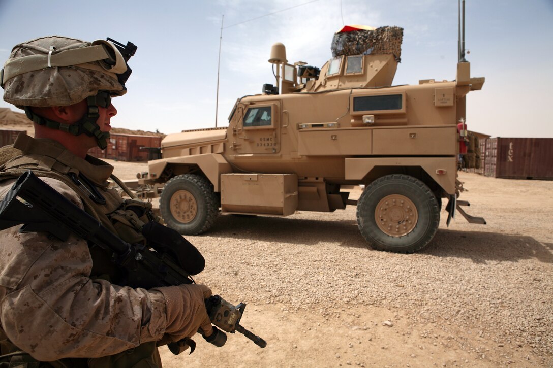 Sergeant Matthew Veniskey, a vehicle commander with Mobile Security Detachment, Regimental Combat Team 8, provides security while MSD Marines prepare to convoy back to Camp Al Asad, Iraq April 25, 2009. One of the MSD’s main tasks is to convoy the regimental commander while providing security.