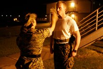 Gunnery Sgt. Ileine Taipe, Sergeant Instructor, counsels a candidate during an Officer Candidate School Preparation weekend at Camp Dodge, Des Moines, Iowa, April 24. The OCS Prep weekend is designed to give candidates a glimpse into what OCS life is like.
