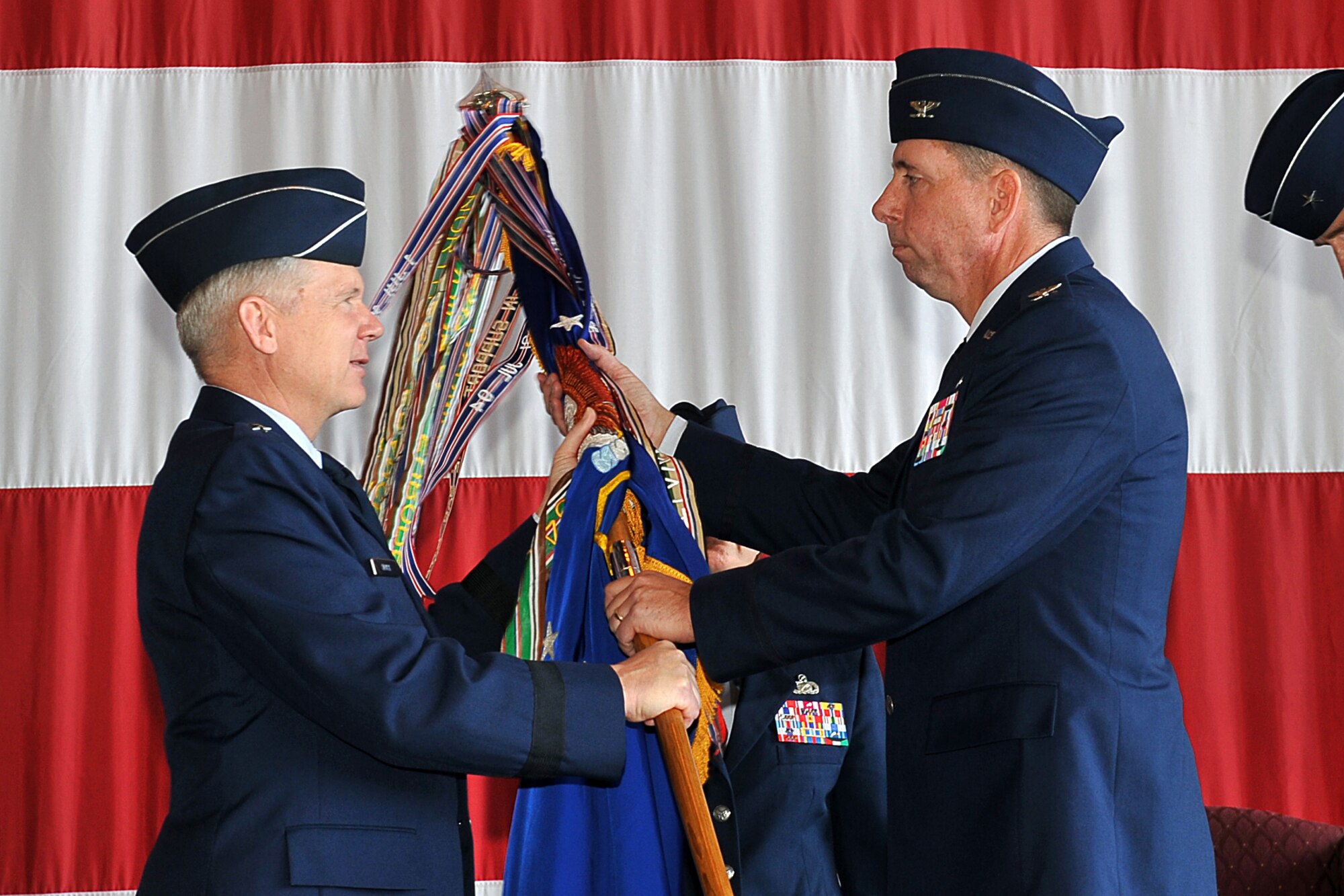 OFFUTT AIR FORCE BASE, Neb,. -- Lieutenant General Robert J. Elder, Jr., 8th Air Force commander, passes the 55th Wing guideon to Col. John N.T. Shanahan, the new 55th WG commander, during the wing change of command ceremony here, April 24. 

U.S. Air Force Photo By: Charles Haymond
