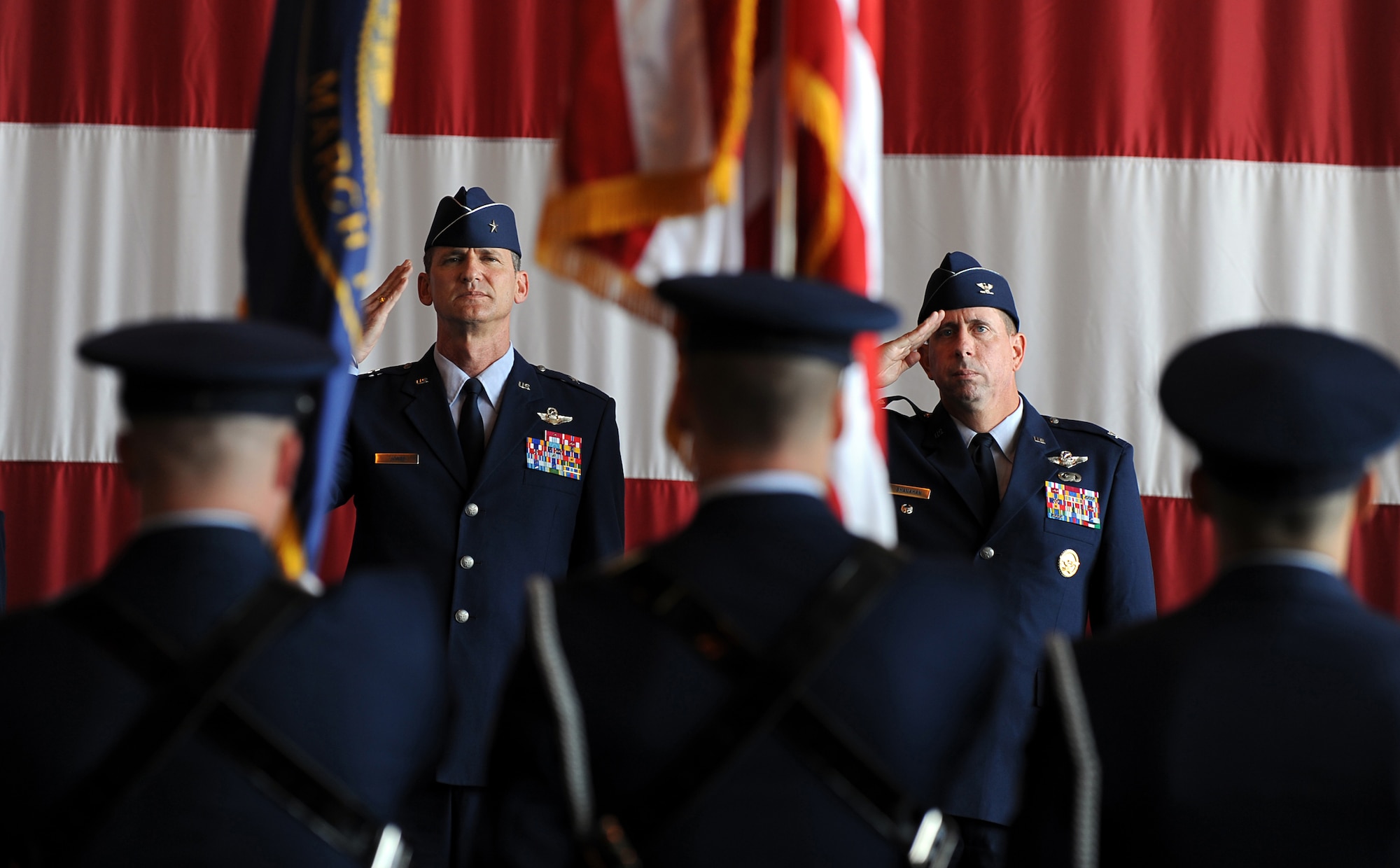 OFFUTT AIR FORCE BASE, Neb. -- Brigadier General James J. Jones, outgoing 55th Wing commander, and Col. John N.T. Shanahan, incoming 55th WG commander, salute the colors held by Offutt AFB Honor Guard Airmen durning the wing change of command ceremony here, April 24.

U.S. Air Force Photo by Josh Plueger
