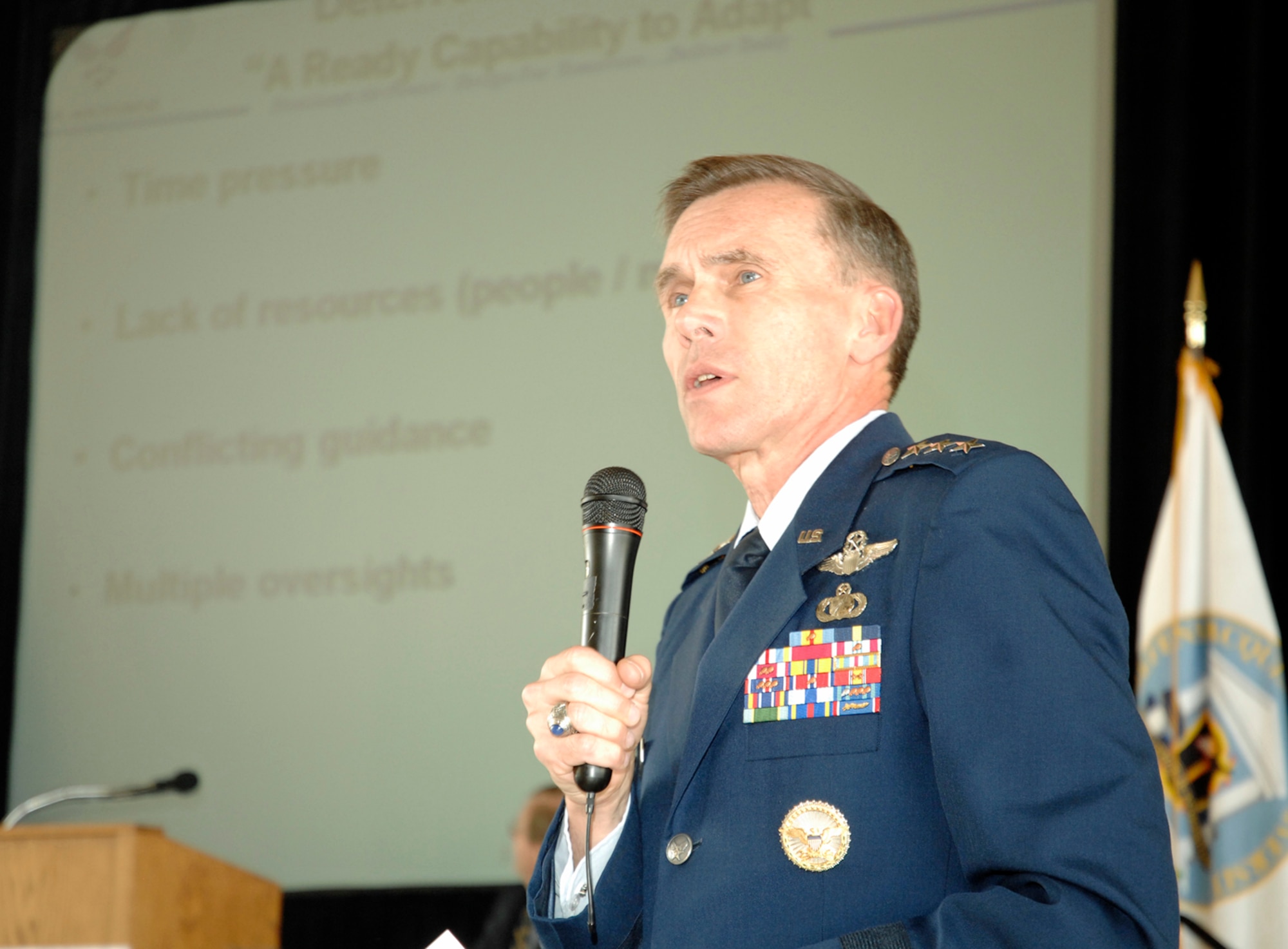 Lt. Gen. Jack Hudson, commander of Aeronautical Systems Center at Wright-Patterson Air Force Base, speaks during a panel discussion on improving the agility of Air Force acquisition to some 700 acquisition professionals and defense industry partners.  The venue was DOD Acquisition Insight Days, held April 20-22 at Sinclair Community College in Dayton, Ohio.  (U.S. Air Force photo/Al Bright)