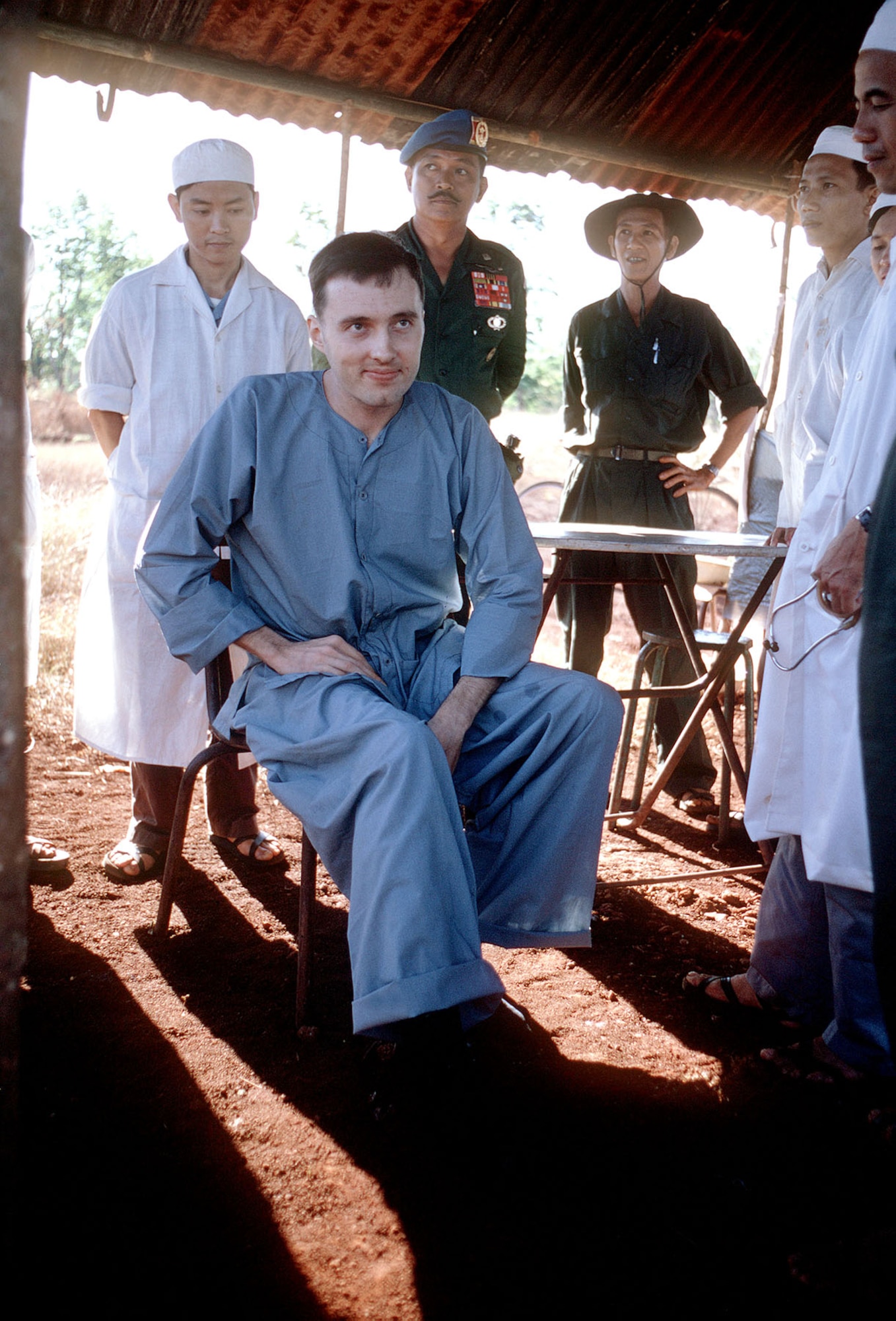 Twenty-seven Americans, most of whom had been held in South Vietnam by the Viet Cong, were released at Loc Ninh and left Vietnam from Saigon. Here, USAF Capt. David Baker, an injured POW, awaits release. (U.S. Air Force photo)