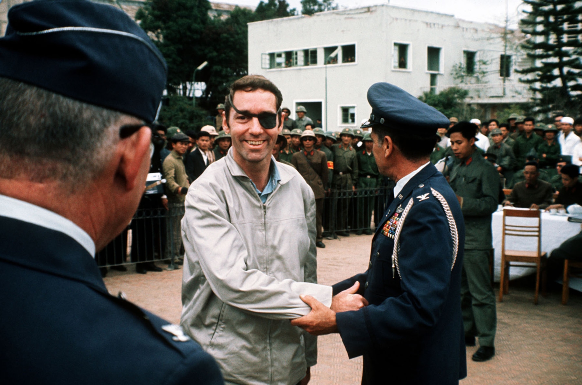 USAF Lt. Col. Lewis Shattuck is greeted at Gia Lam Airport. (U.S. Air Force photo)