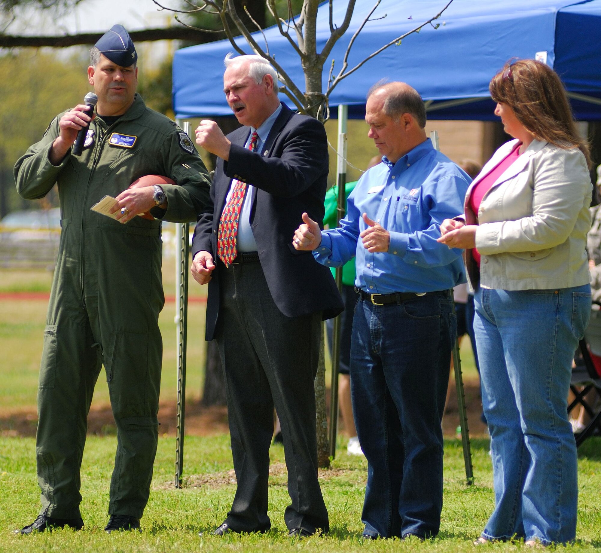 Col. Greg Otey, 19th Airlift Wing commander, introduces the 19 Airlift Wing’s Rodeo Team civic leaders; the Honorable Tommy Swaim, City of Jacksonville Mayor, Larry Wilson, President and CEO Arkansas Bank and Trust and Amy Schlesing, Arkansas Democrat-Gazette at the Little Rock Air Force Base “Fit to Fight Sports Day” April 17, 2009. These leaders will accompany the Little Rock AFB Rodeo team to the Rodeo competition at McChord AFB, Wash. (U.S. Air Force photo by Staff Sgt. Juan Torres)