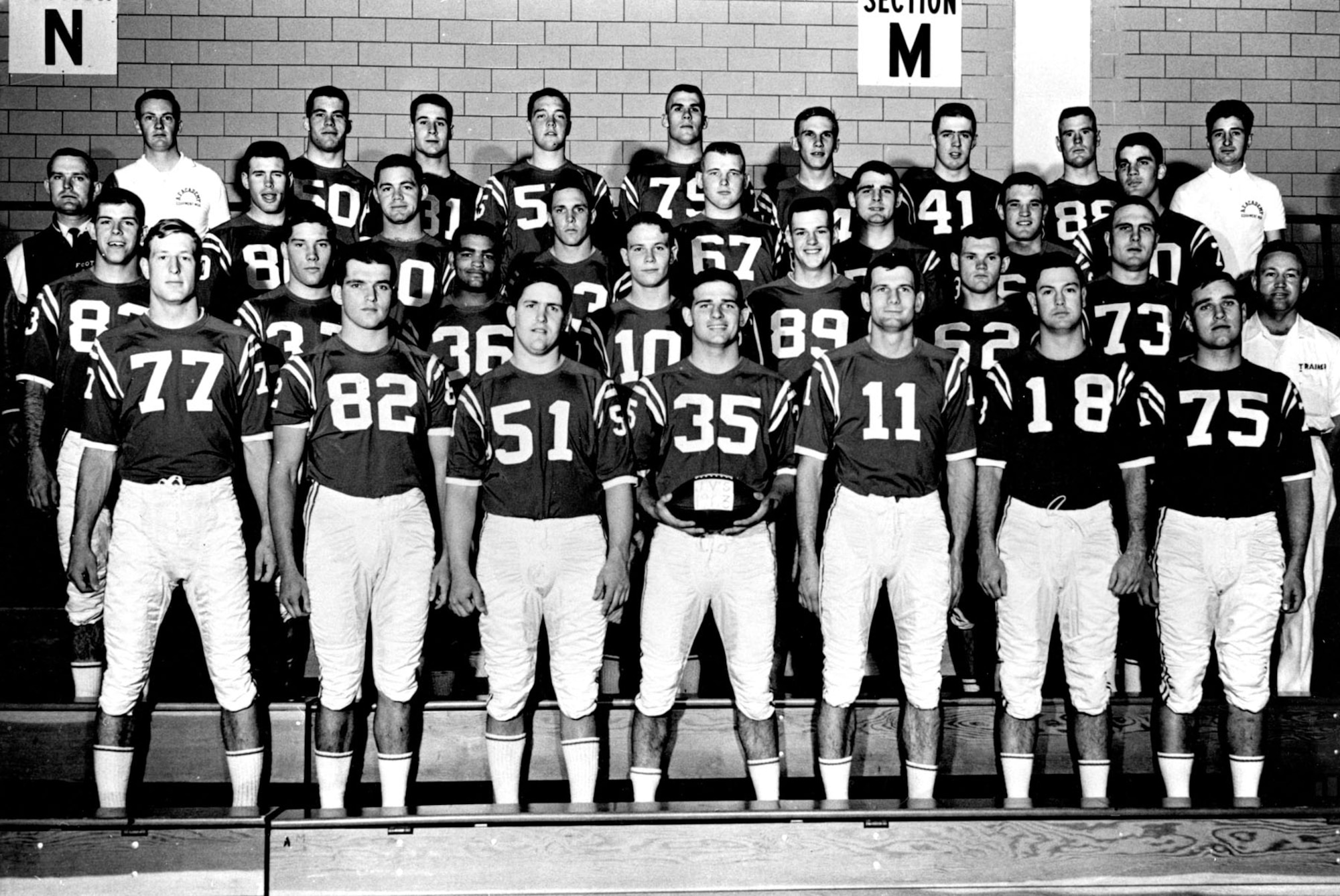 The 1963 Air Force Academy junior varsity football team. Cadet Lance Sijan is number 82 in the front row. (U.S. Air Force photo)