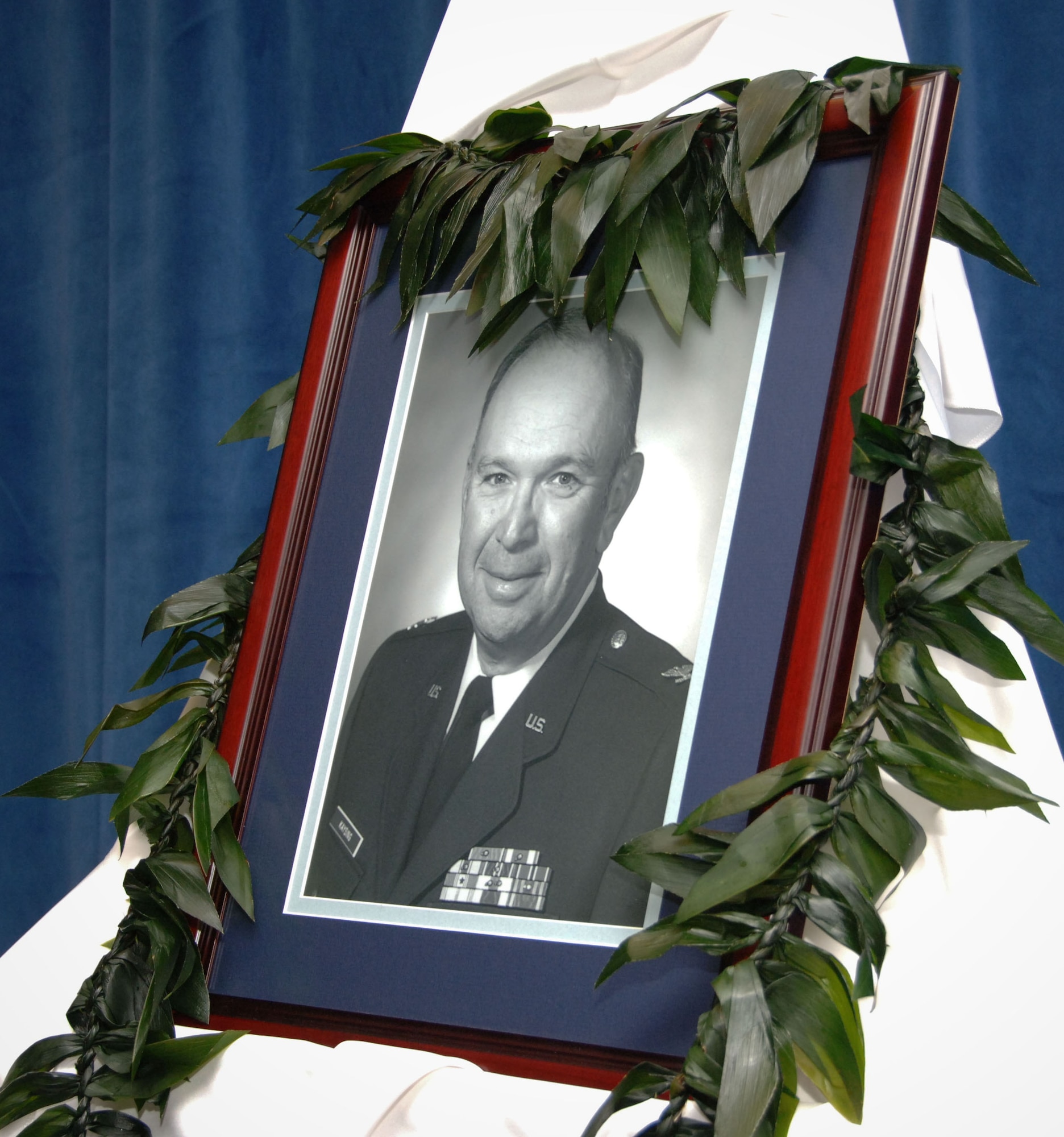 More than 30 family, friends and faculty gathered in the Ira C. Eaker College for Professional Development's Defense Financial Management & Comptroller School auditorium for a dedication ceremony held April 17 in honor of Col. Charles "Chuck" Kaysing. Colonel Kaysing served in the Air Force from June 1963 to August 1993 and held leadership positions as the commandant of the Professional Military Comptroller School, now DFM & CS, Pacific Air Forces comptroller, former president and treasurer of the Air University Foundation and president of the American Society of Military Comptrollers. (U.S. Air Force photo by Melanie Rodgers Cox)