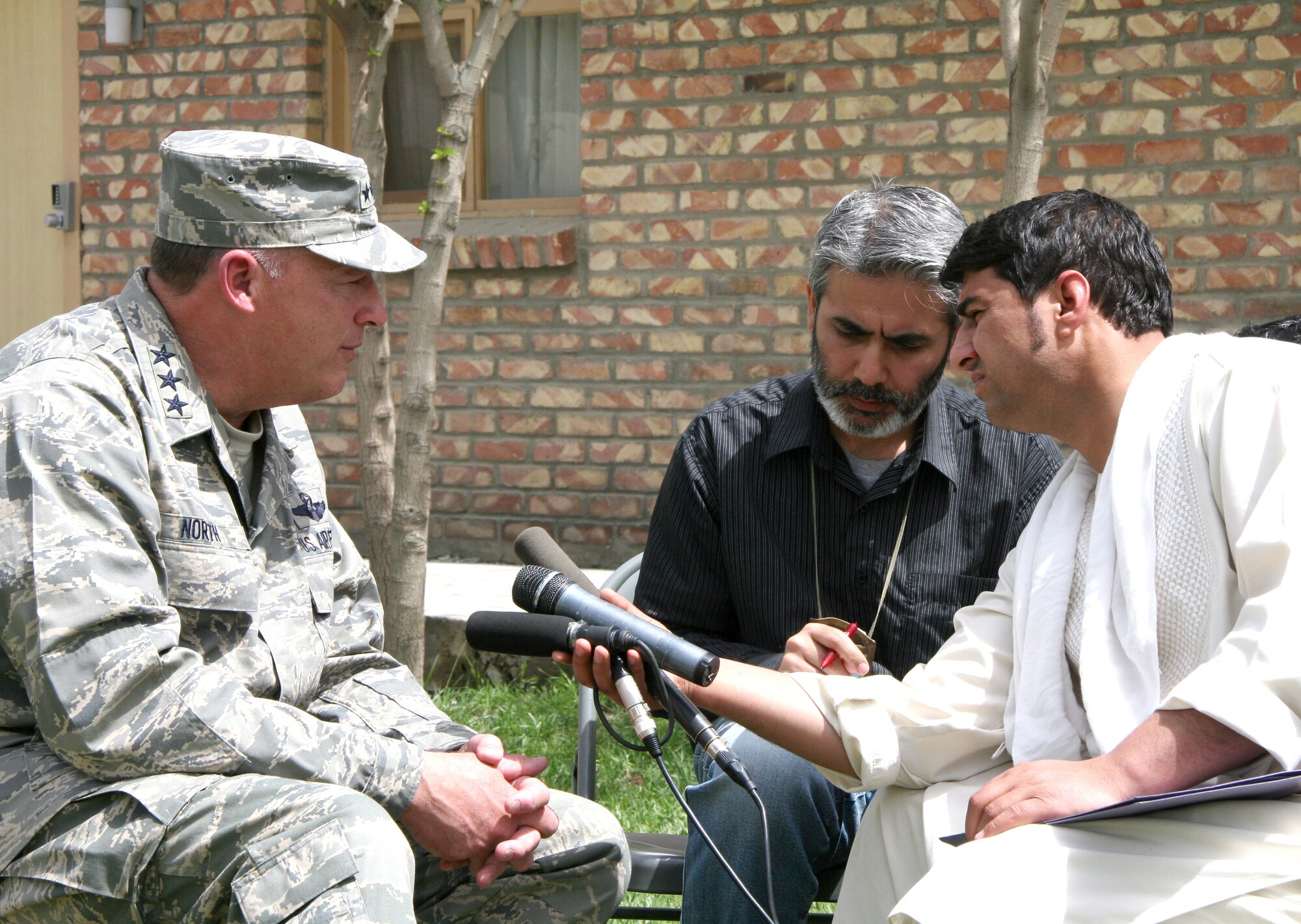 Lt. Gen. Gary North, Combined Forces Air Component Commander (CFACC) for Southwest Asia, meets individually with Afghan media following his news conference during ?Bagram Media Days? April 19, 2009. (U.S. Air Force photo by Col. August Schalkham)