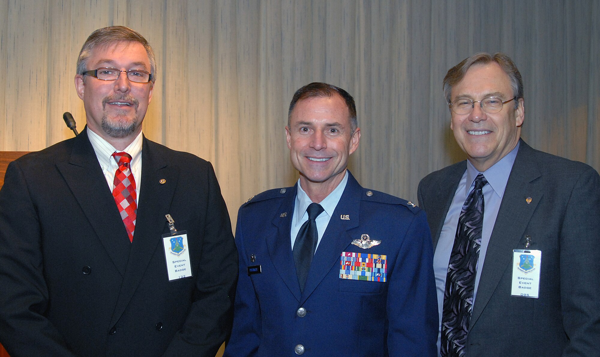 Col. Kevin Pottinger, (center) ARPC commander, is pictured with Craig Ward, (left) Aurora Chamber of Commerce Defense Council chair, and George Peck, Aurora Chamber of Commerce vice president. ARPC hosted more than 60 business, community and military leaders, during the Defense Council meeting April 23. (U.S. Air Force photo/Greg Simmonds)