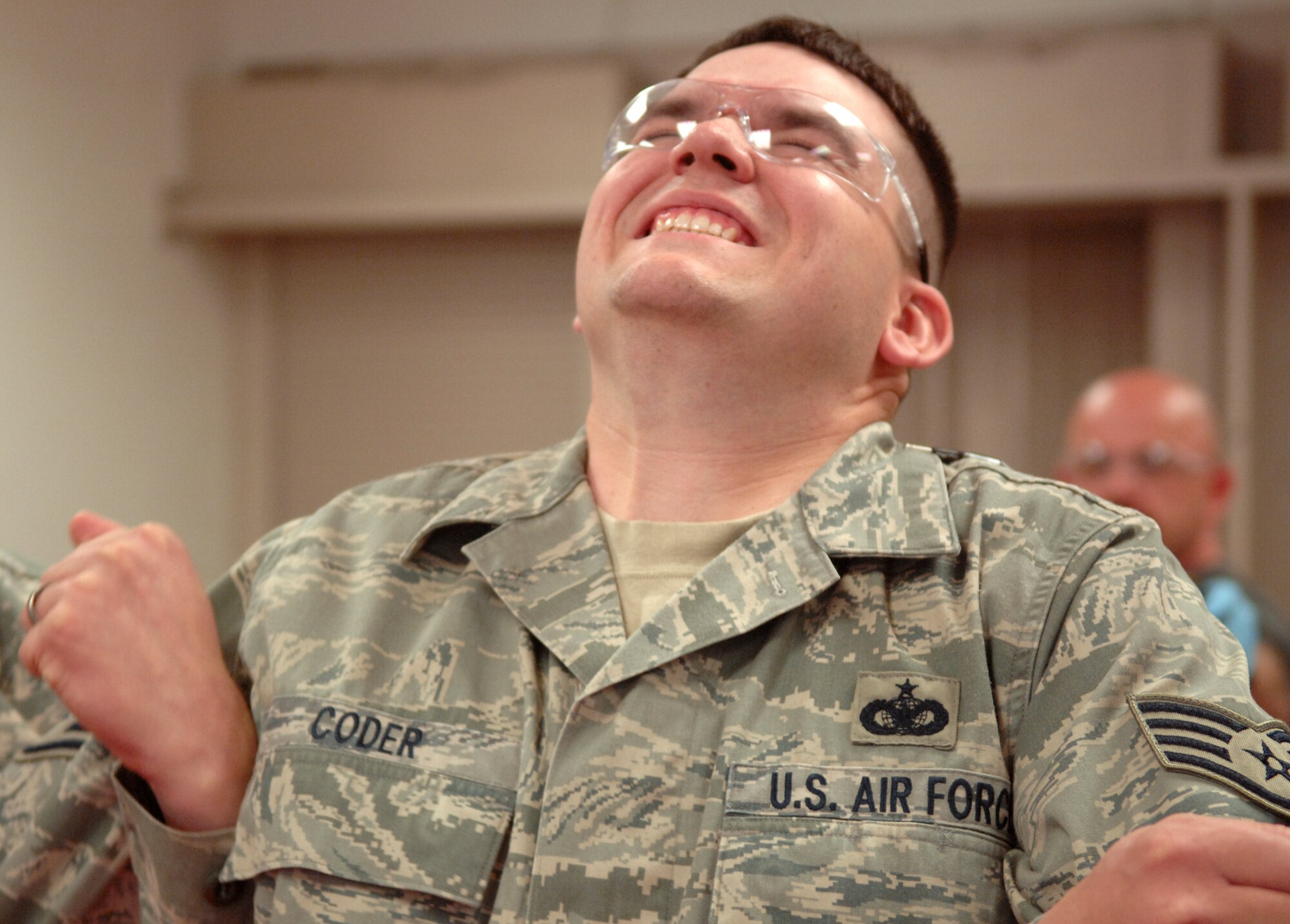 WHITEMAN AIR FORCE BASE, Mo. – Staff Sgt. William Coder, 509th Security Forces Squadron, gets hit with a taser during training April 22.  This training is to certify security forces law enforcement personnel to carry and use the X26 Taser. The taser is a less than lethal alternative to aid law enforcement with defiant subjects. (U.S. Air Force photo/Senior Airman Stephen Linch)