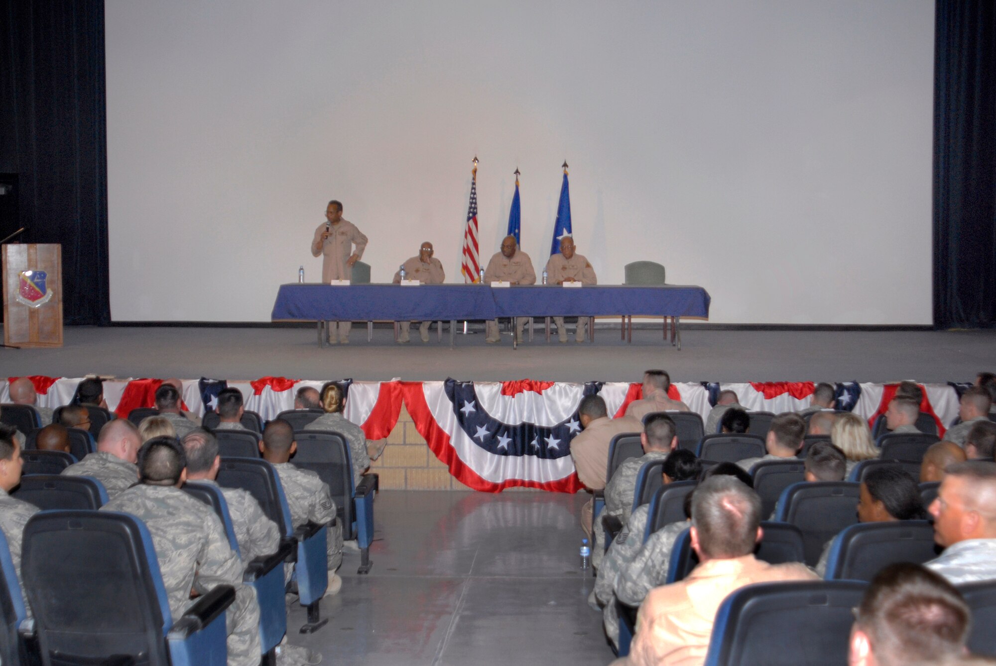 Retired U.S. Air Force Lt. Gen. Russell Davis, Chapter President of the Tuskegee Airmen, spoke with personnel on base about the history of the Tuskegee Airmen, during their visit to the U.S. Central Command's Area of Responsibility, Apr. 22, 2009, at an undisclosed location in Southwest Asia.  The Tuskegee Airmen spoke and answered questions about their history and gave words of inspiration for military members supporting Operations Iraqi and Enduring Freedom and Combined Joint Task Force - Horn of Africa on base during their question and answer session in the base theatre.  (U.S. Air Force photo/Senior Airman Andrew Satran/released)