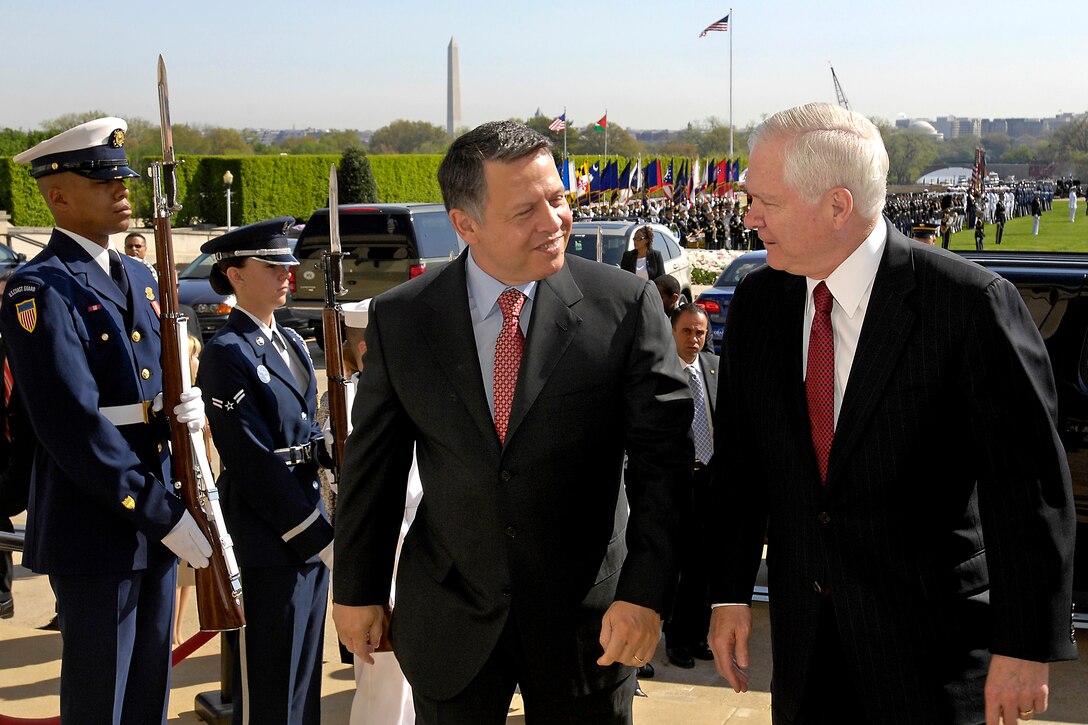 Defense Secretary Robert M. Gates, right, escorts King Abdullah II, left, ruler of the Hashemite Kingdom of Jordan, into the Pentagon, April 24, 2009. Abdullah was welcomed with a full honors arrival ceremony on the Pentagon parade field and then met with Gates to discuss a variety of regional security issues.