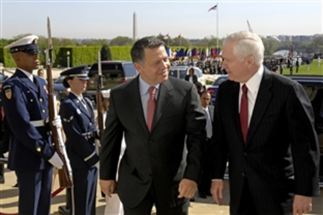 Defense Secretary Robert M. Gates, right, escorts King Abdullah II, left, ruler of the Hashemite Kingdom of Jordan, into the Pentagon, April 24, 2009. Abdullah was welcomed with a full honors arrival ceremony on the Pentagon parade field and then met with Gates to discuss a variety of regional security issues. 