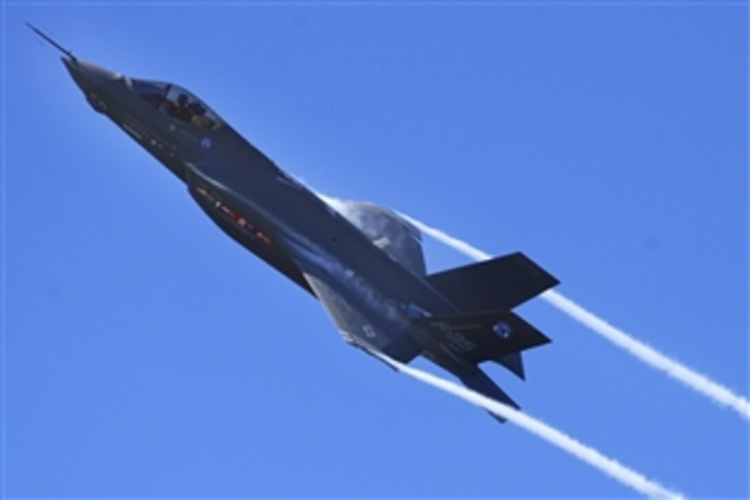 An F-35 Lightning II flies overhead for the first time on Elgin Air Force Base, Fla., April 23, 2009. The aircraft is the first at Eglin, which will be the future home of the Joint Strike Fighter training facility. 