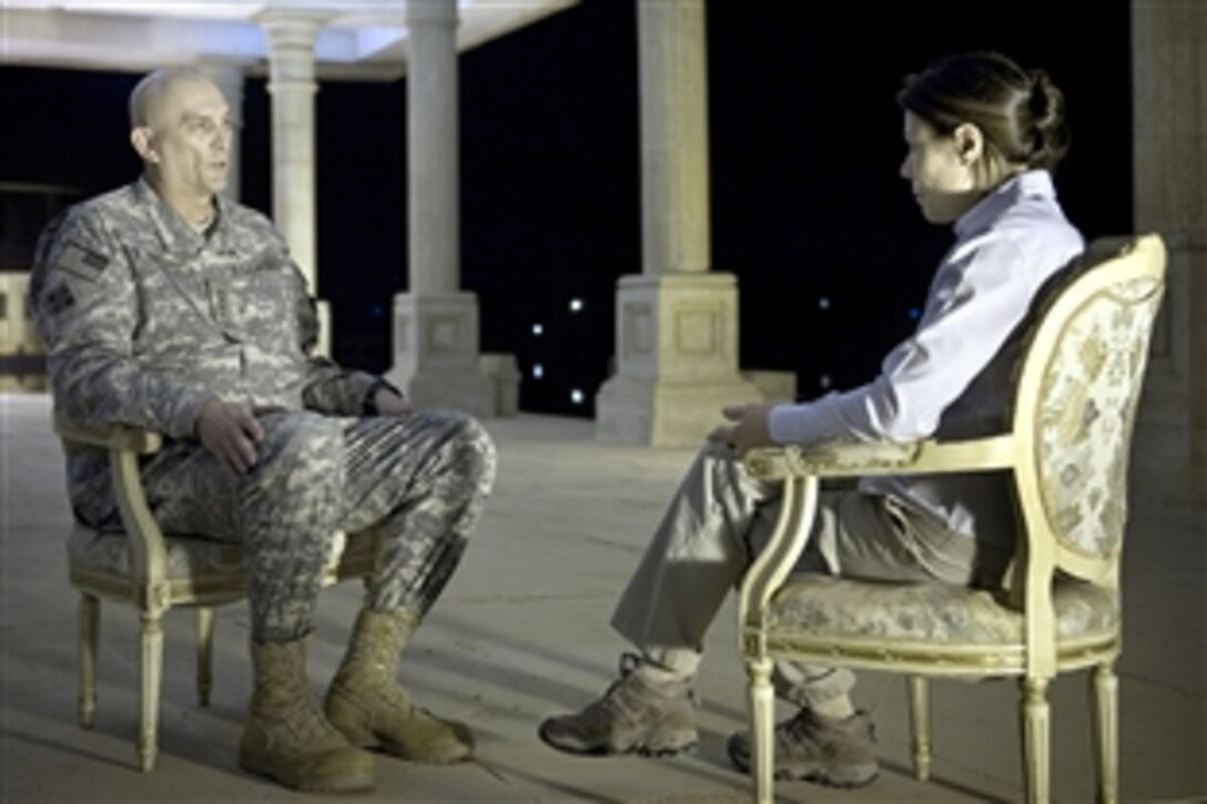 U.S. Army Gen. Raymond T. Odierno, commanding general, Multinational Force Iraq, talks with Ann Curry, NBC's "Today" show news anchor, during an interview on Camp Victory, Baghdad, Iraq, April 24, 2009.