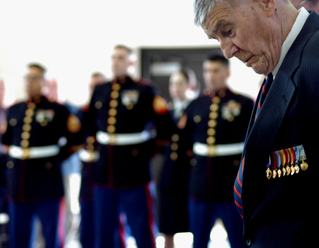 1st Lt. Joseph Owen (Retired) bows his head ahead of the ceremony's invocation at the Reserve Training Center in Mattydale, NY April 24.